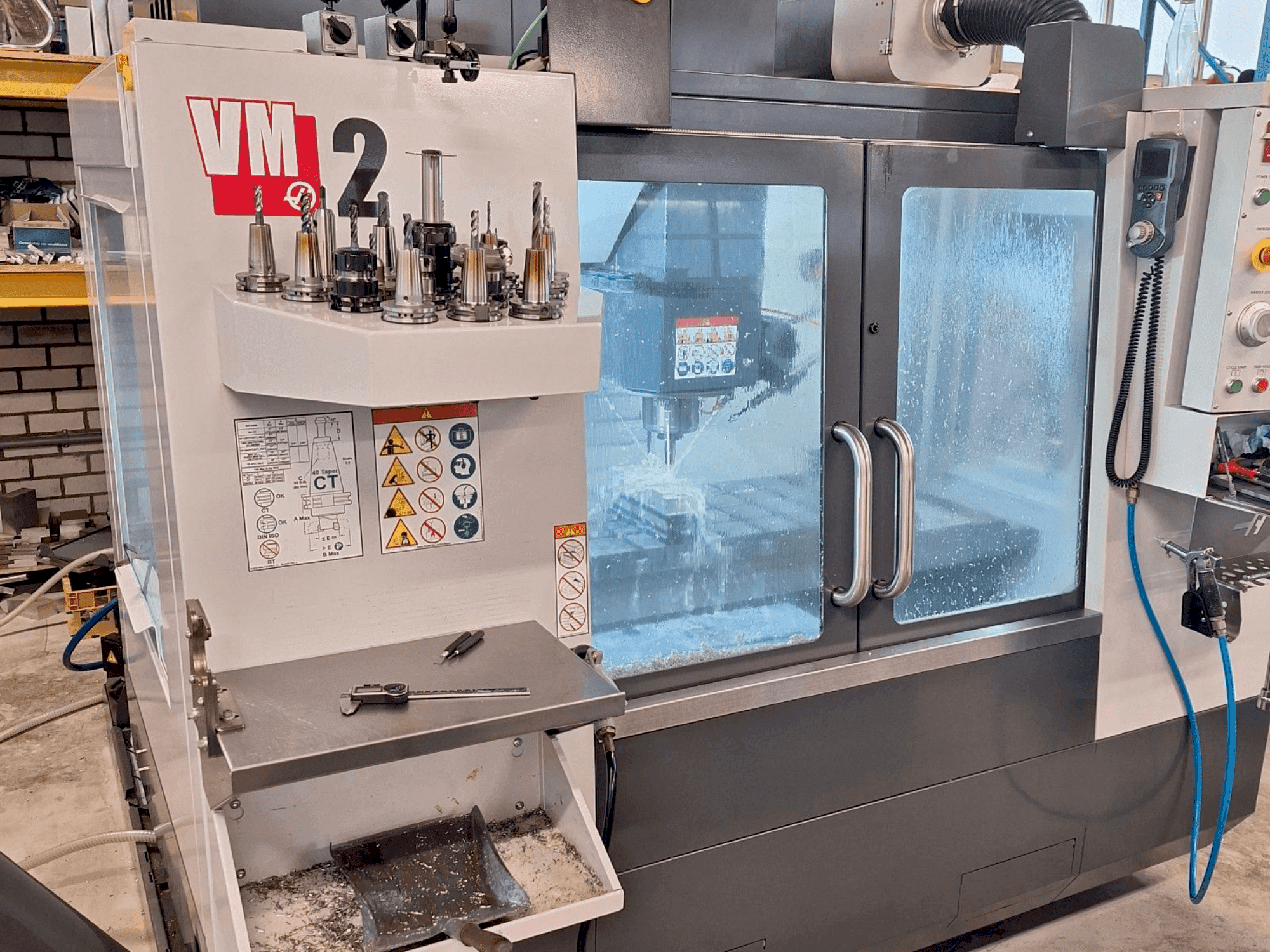 Mašīnas HAAS VM-2 pretskats