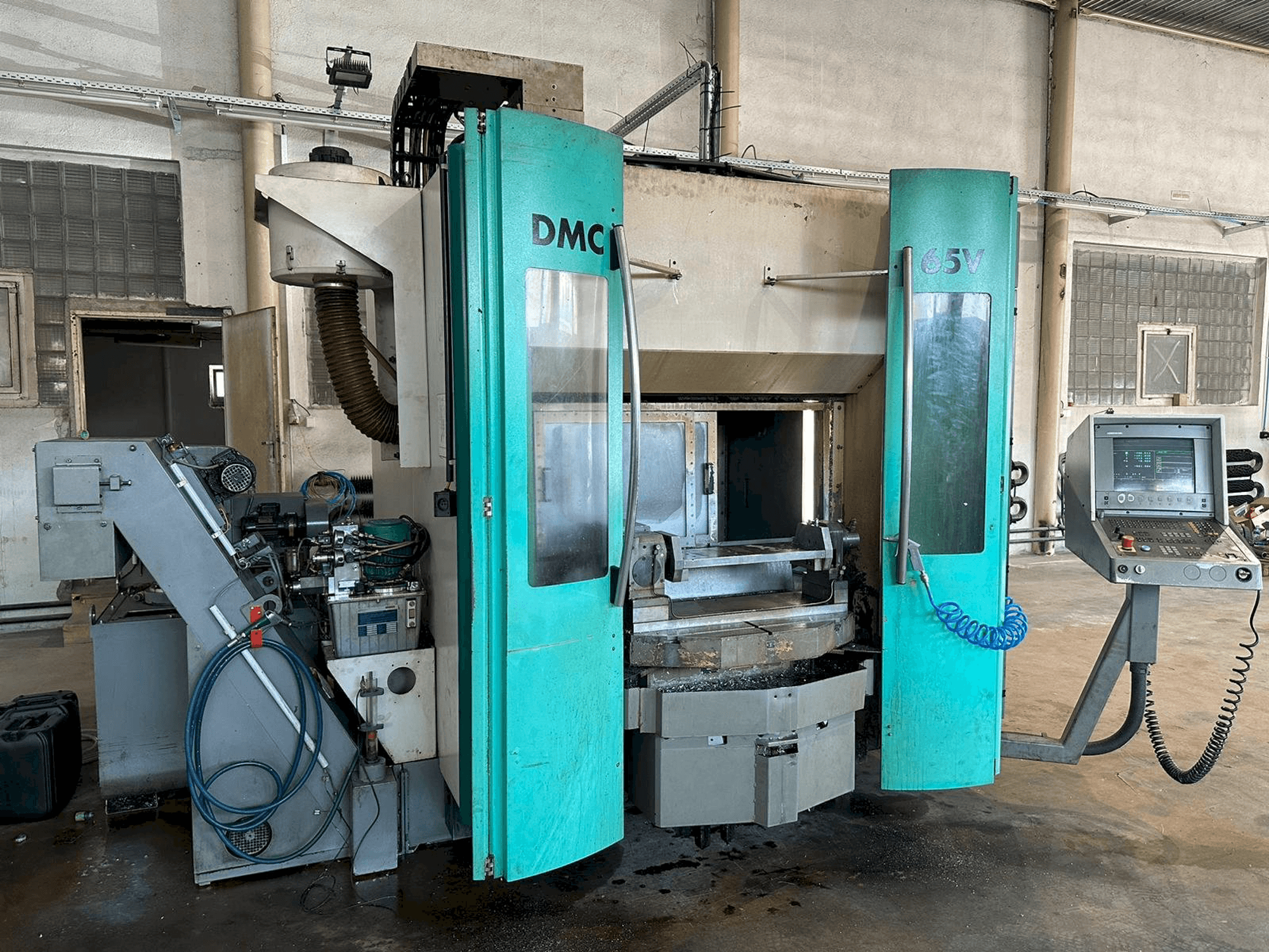 Mašīnas DECKEL MAHO DMC 65V pretskats