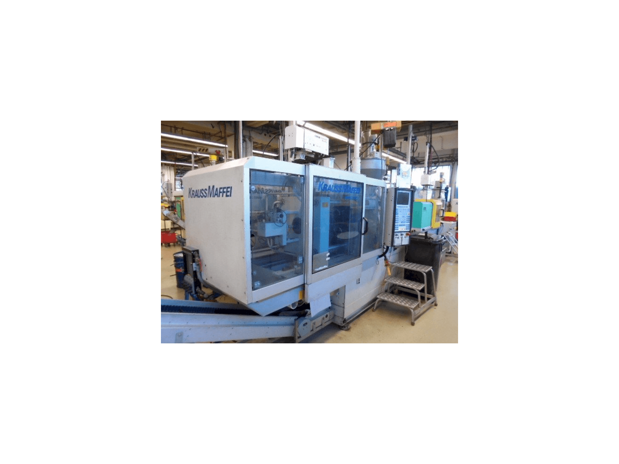 Mašīnas Krauss Maffei KM 65-390-C2 kreisās malas skats