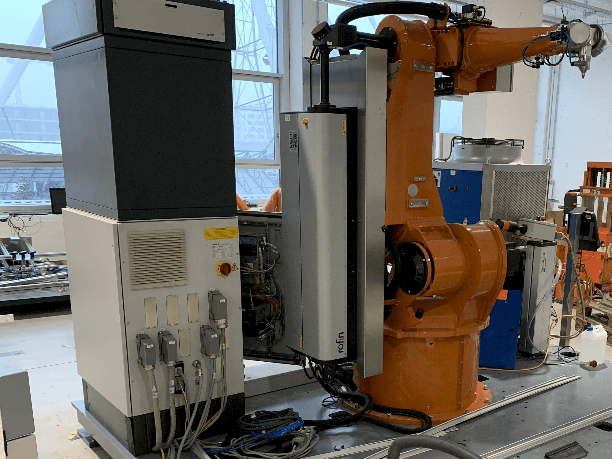 Mašīnas Reis Robotics Laserroboter RV6L pretskats