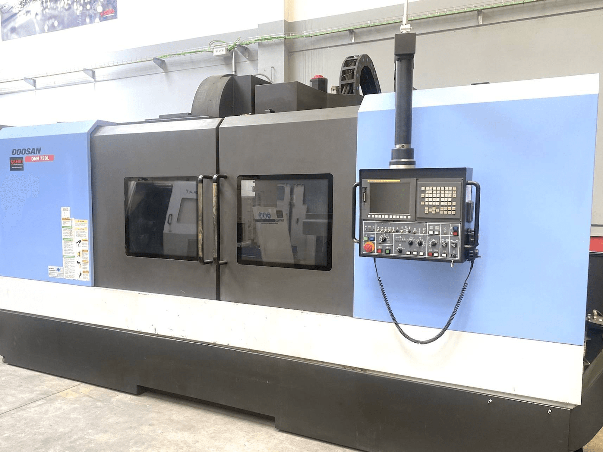 Mašīnas Doosan DNM 750L pretskats