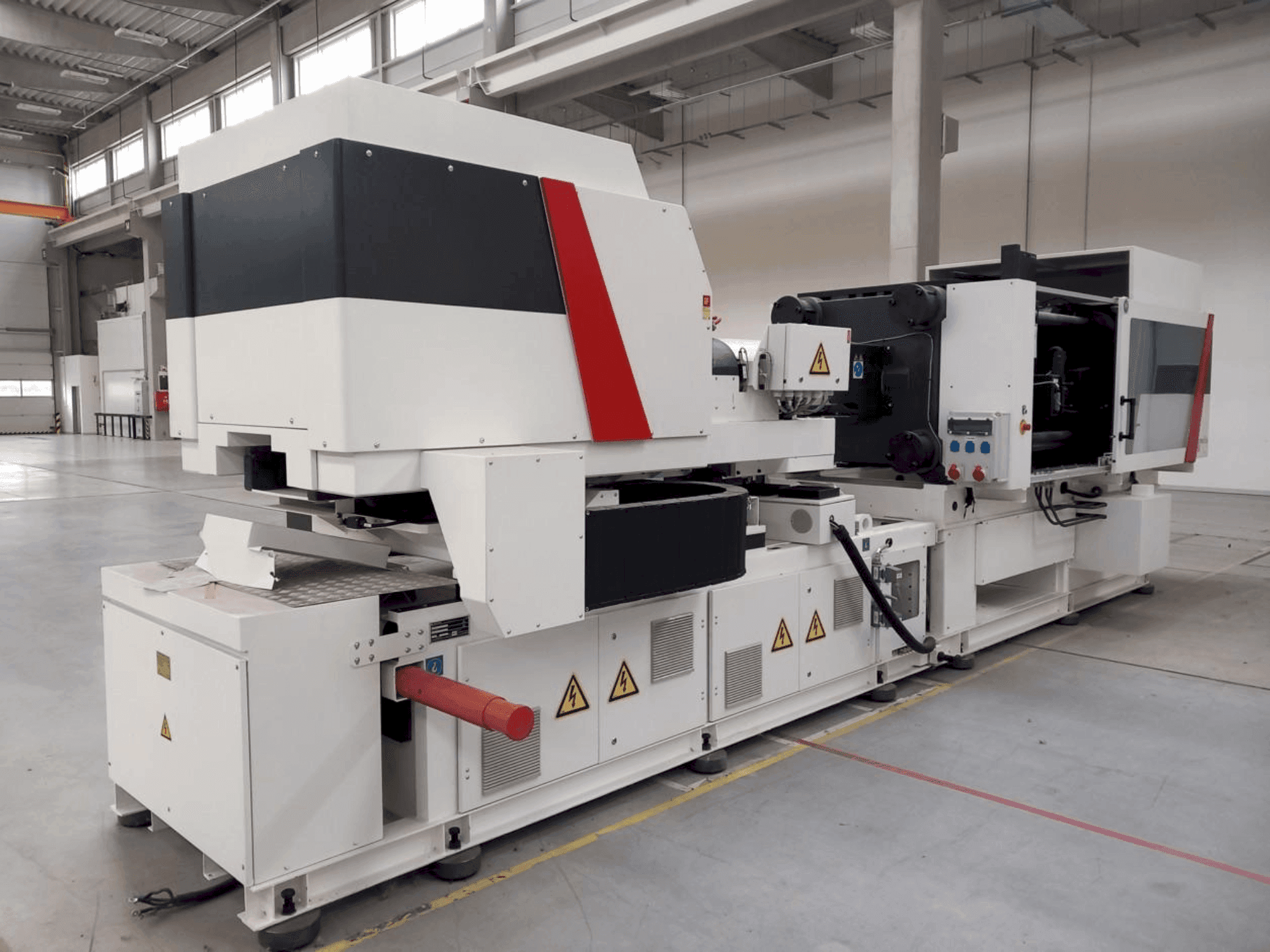 Mašīnas Milacron Elektron Evo 350 pretskats