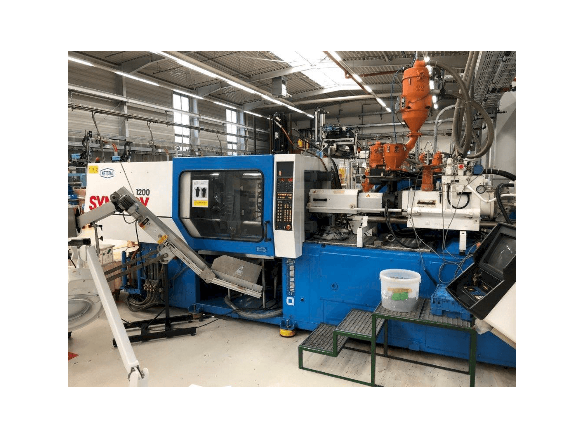 Mašīnas Netstal Synergy S1200-230 pretskats