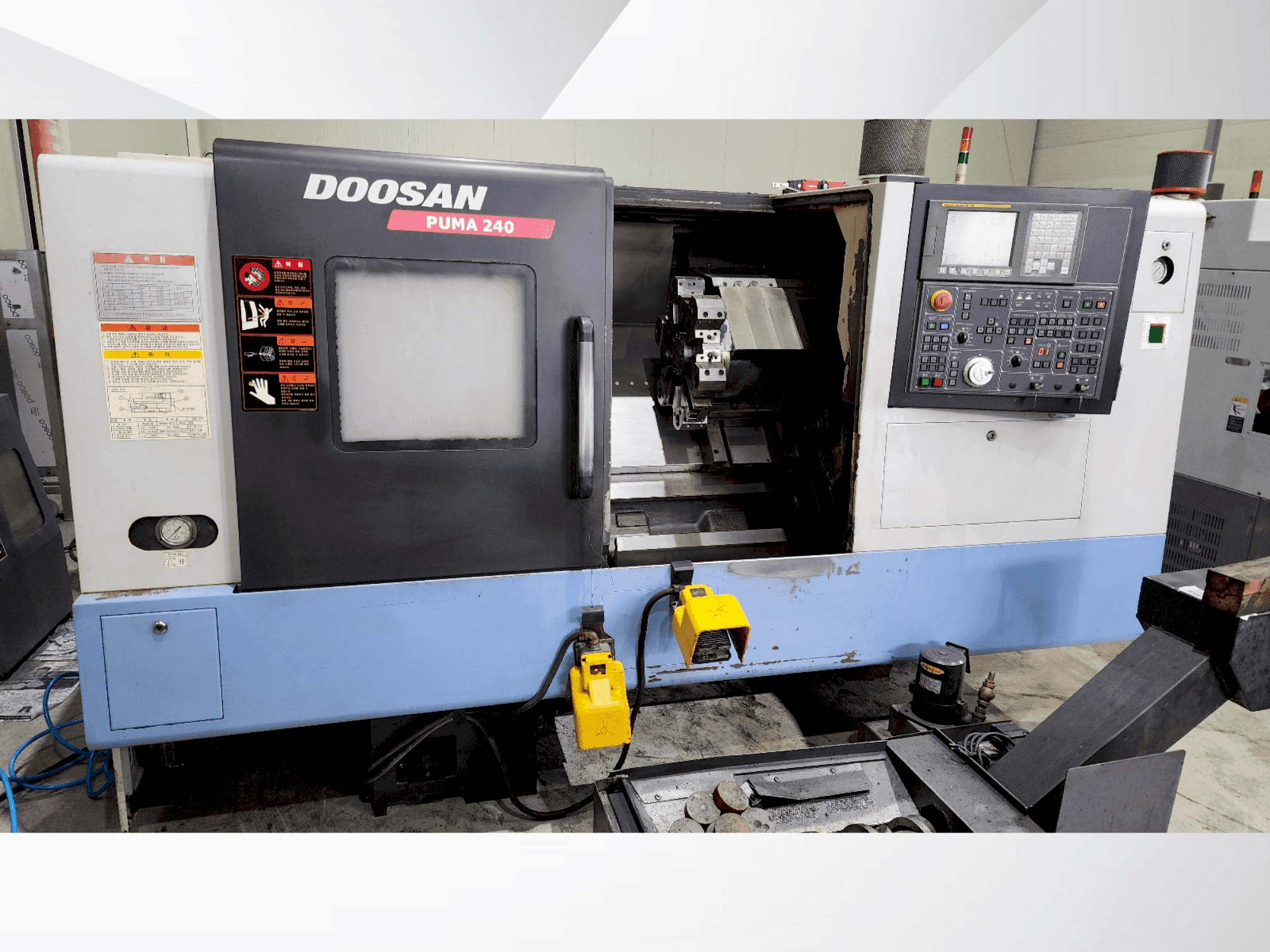 Mašīnas DOOSAN PUMA 240B pretskats