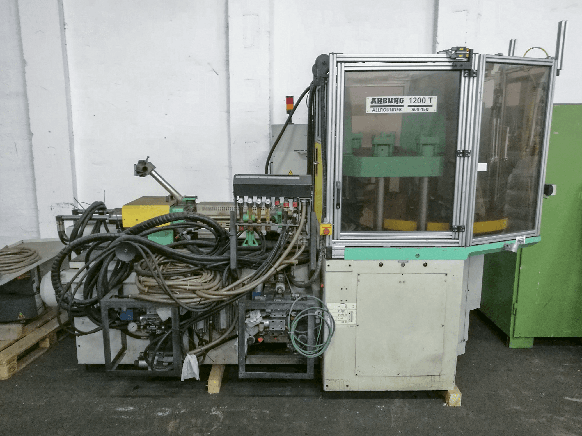 Mašīnas Arburg 1200TS 800-150 pretskats