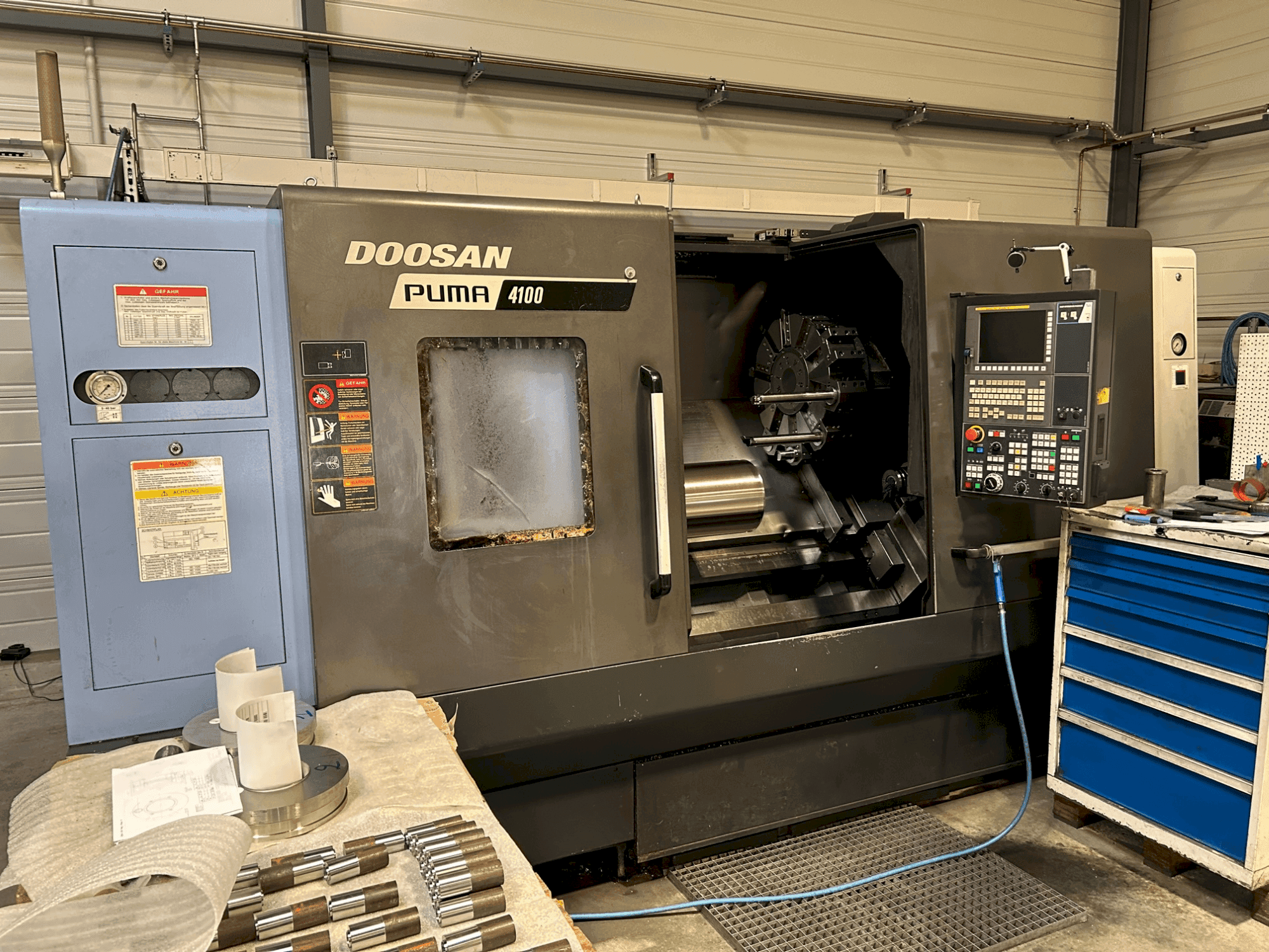 Mašīnas DOOSAN PUMA 4100B pretskats