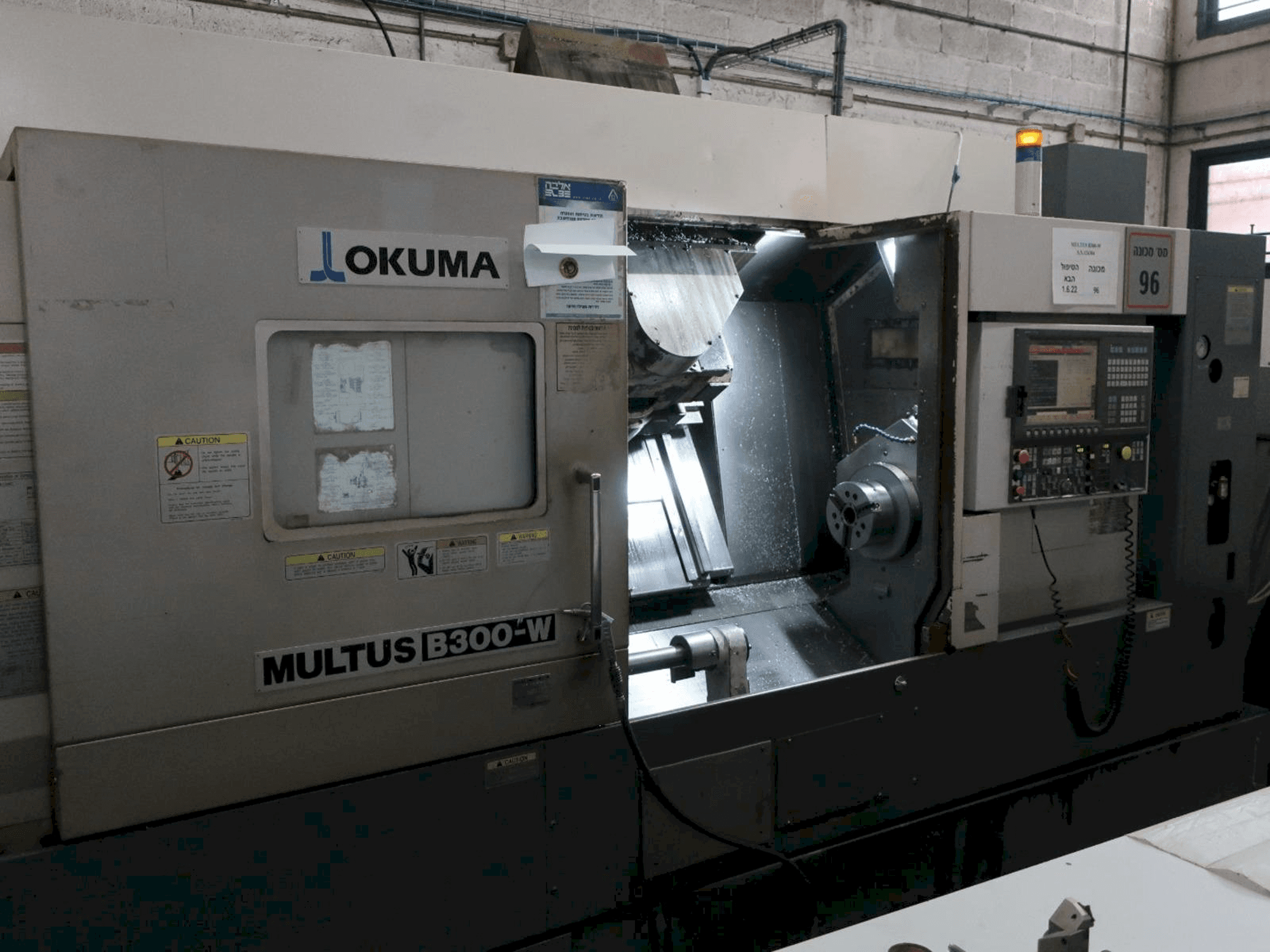 Mašīnas Okuma MULTUS B300-W pretskats