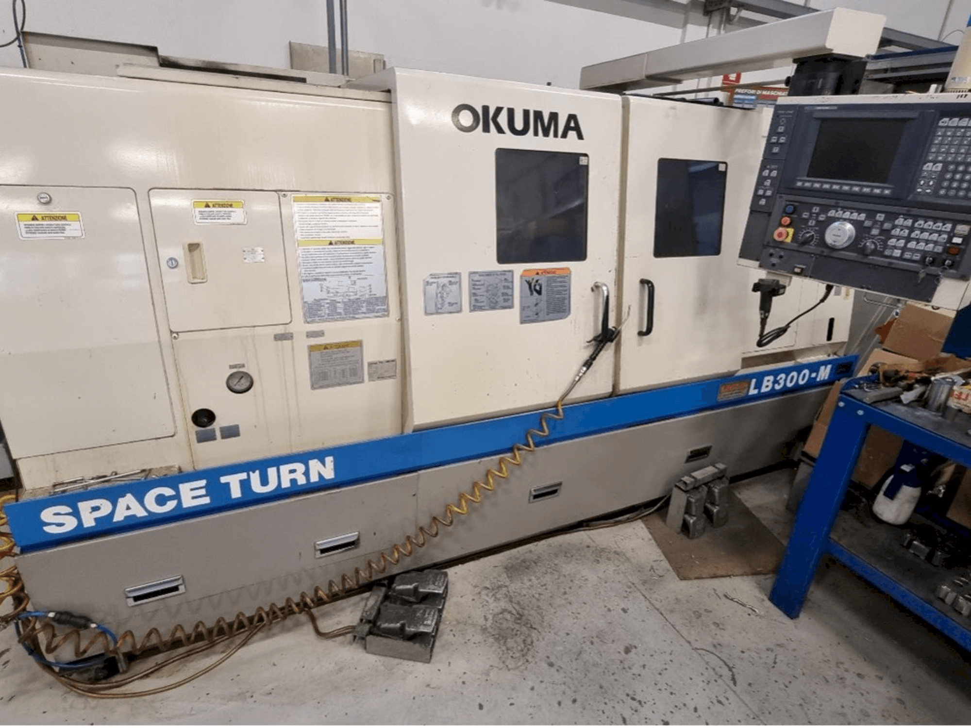 Mašīnas Okuma LB 300M pretskats