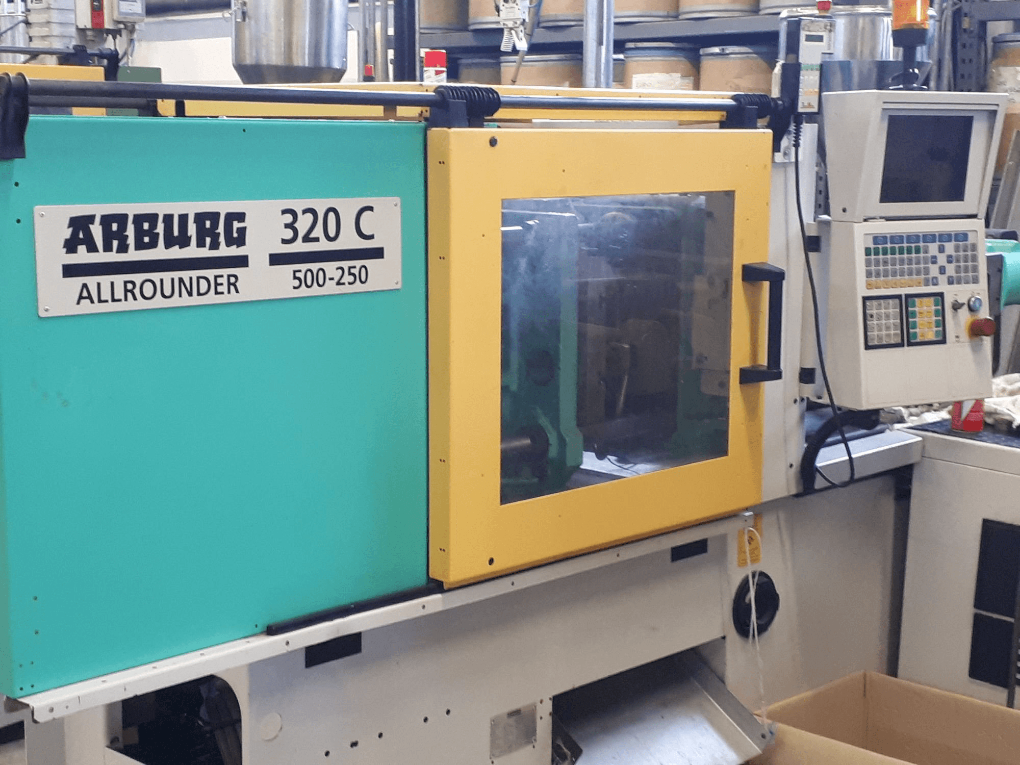 Mašīnas Arburg 320c 500-250 pretskats