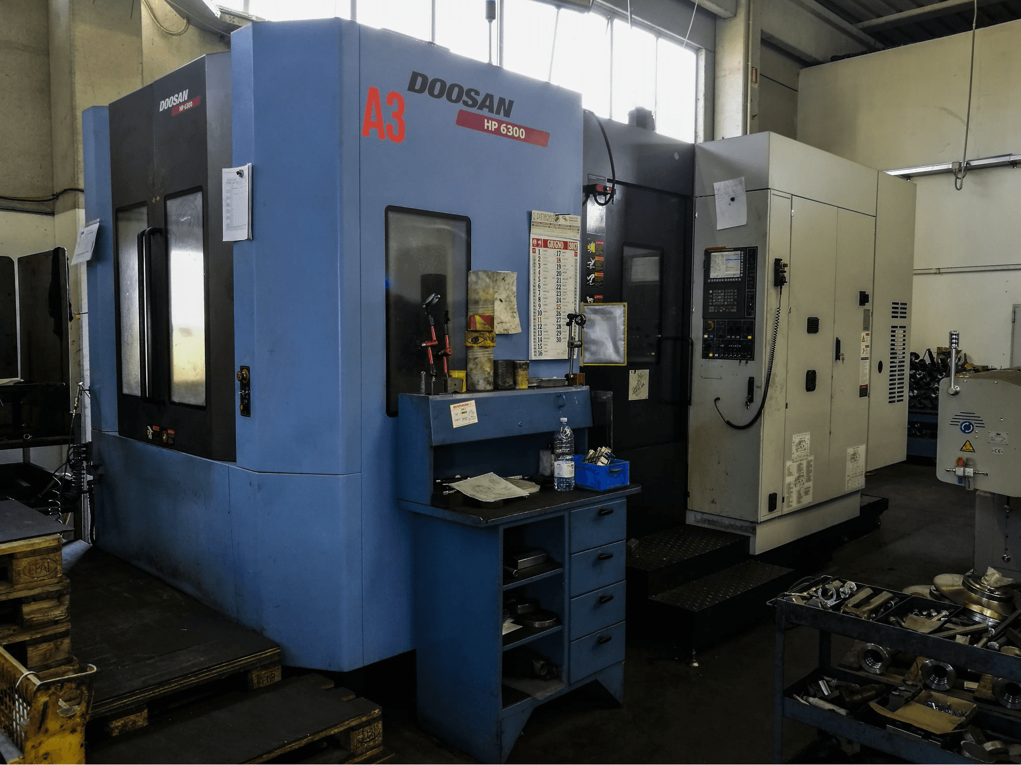 Mašīnas Doosan HP 6300 skats no kreisās puses