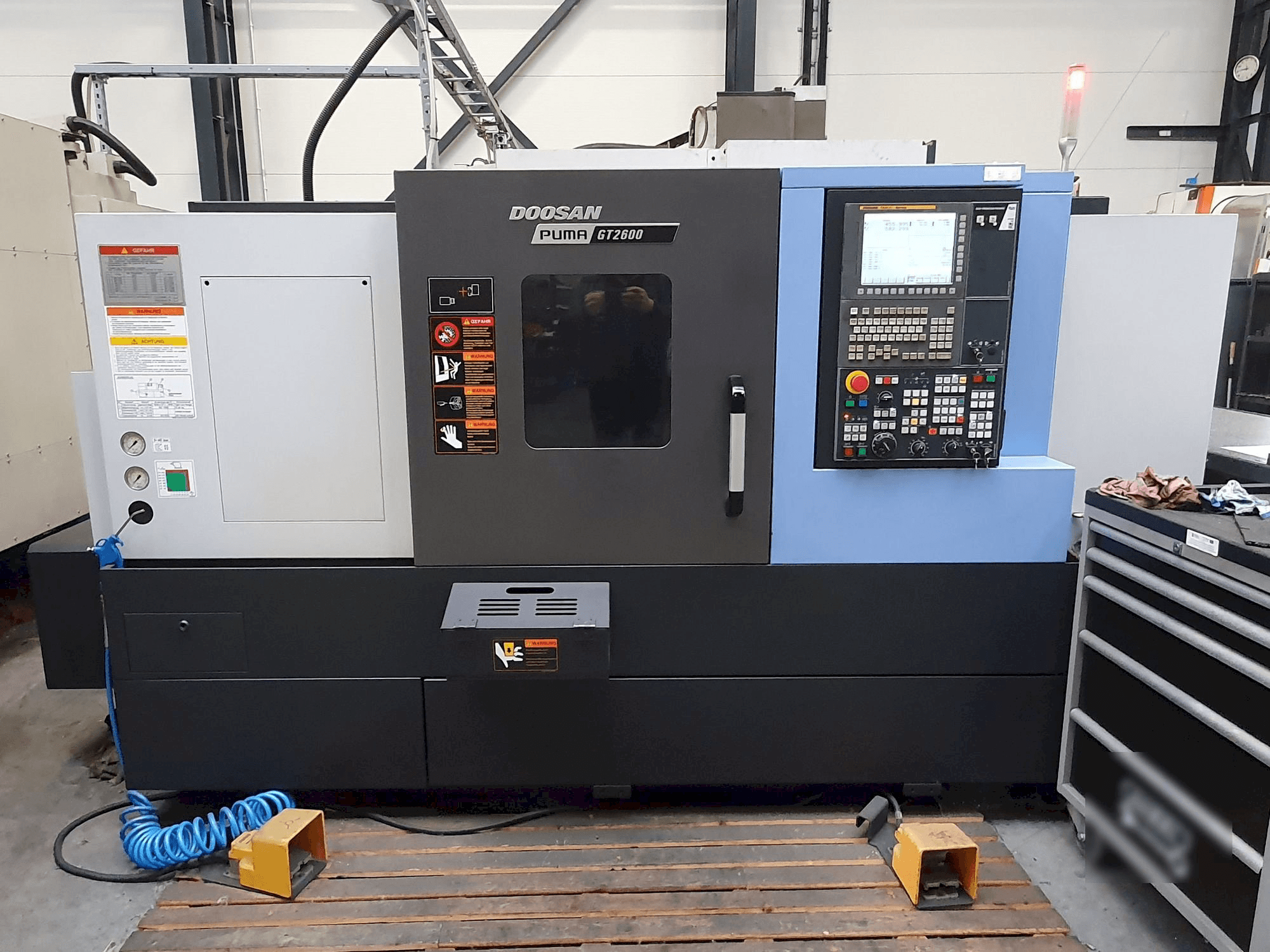 Mašīnas Doosan PUMA GT2600 pretskats