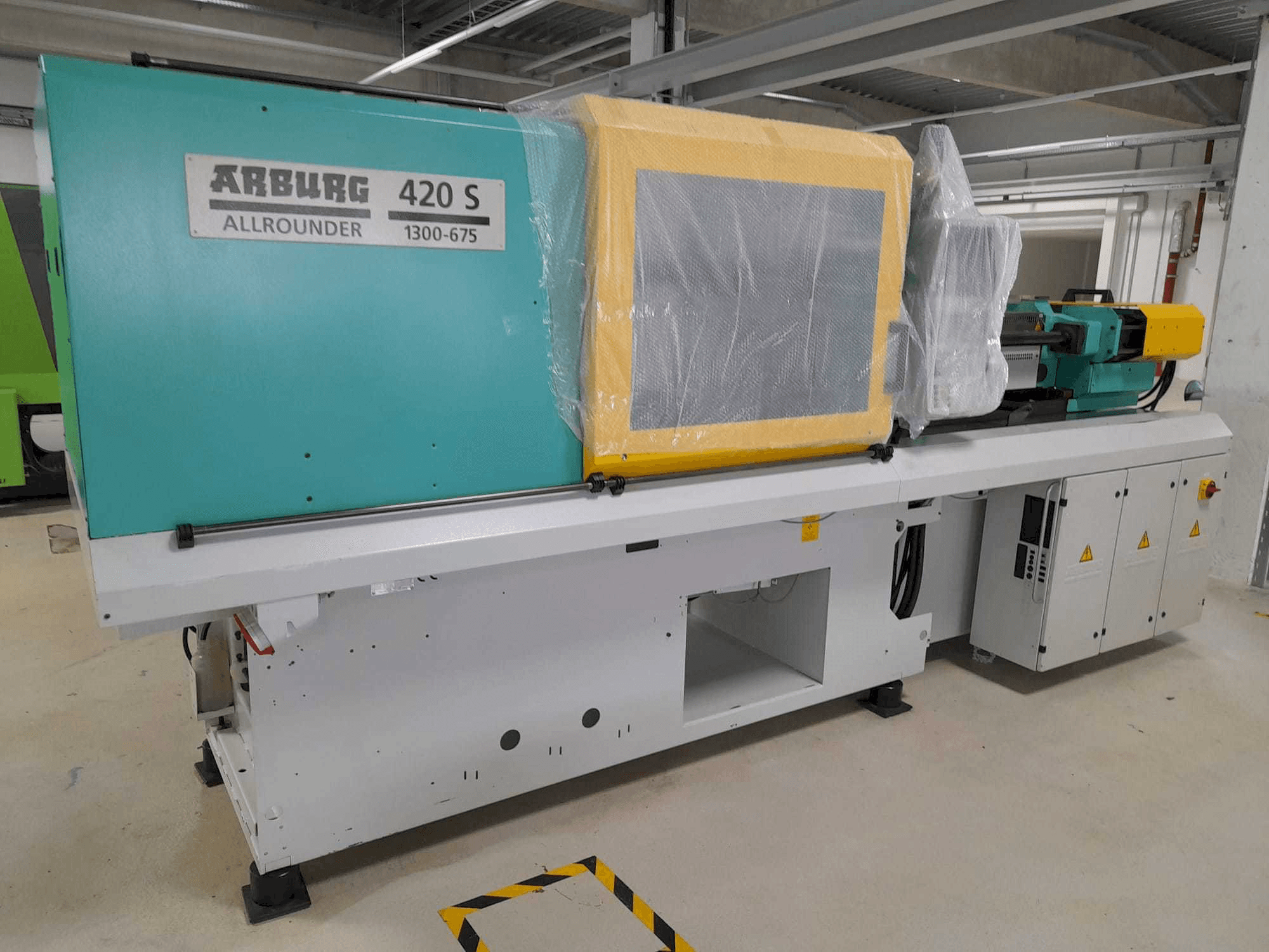 Mašīnas Arburg Allrounder 420S 1300-675 pretskats