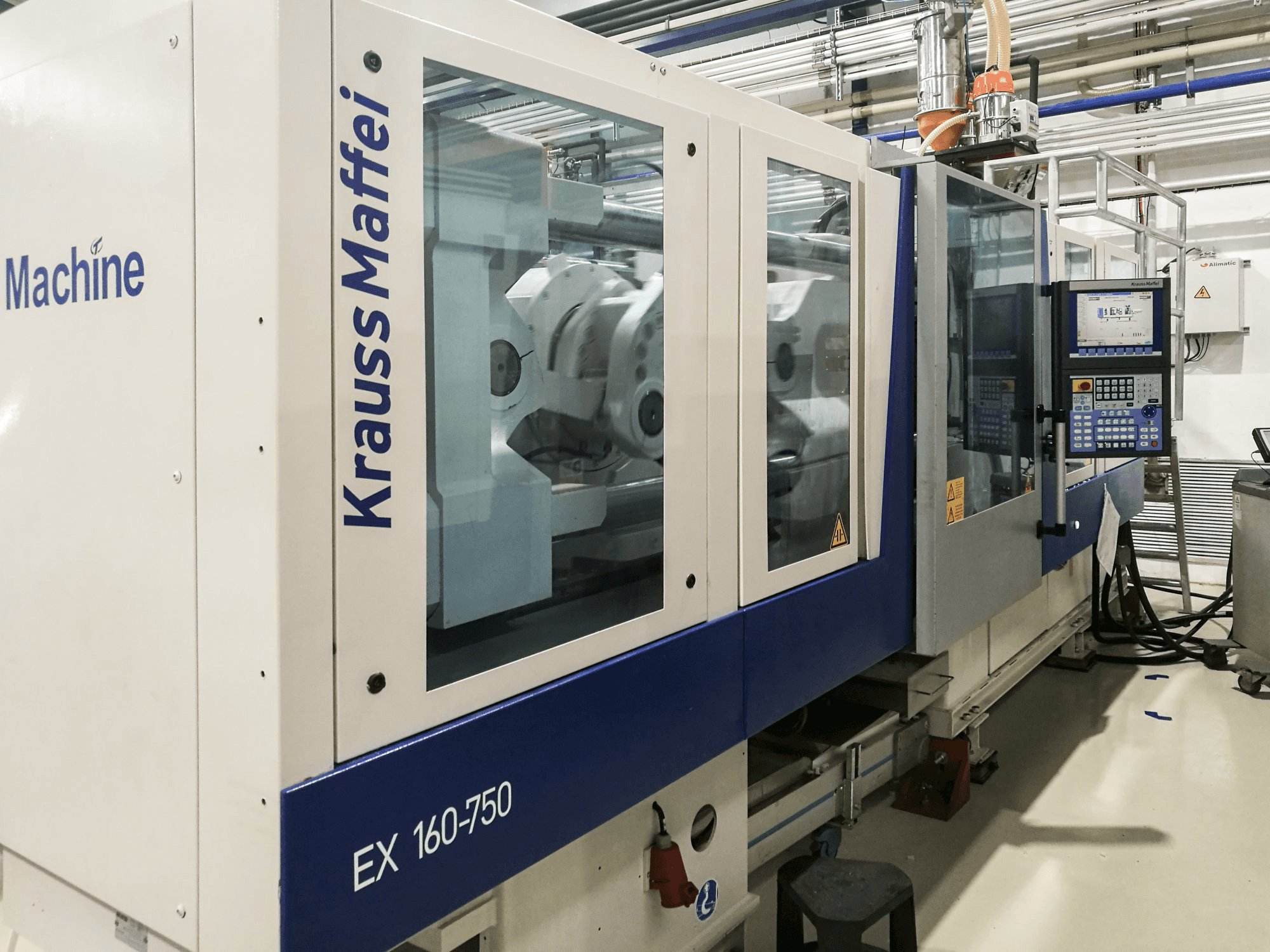 Mašīnas Krauss Maffei 160-750 EX skats no kreisās puses
