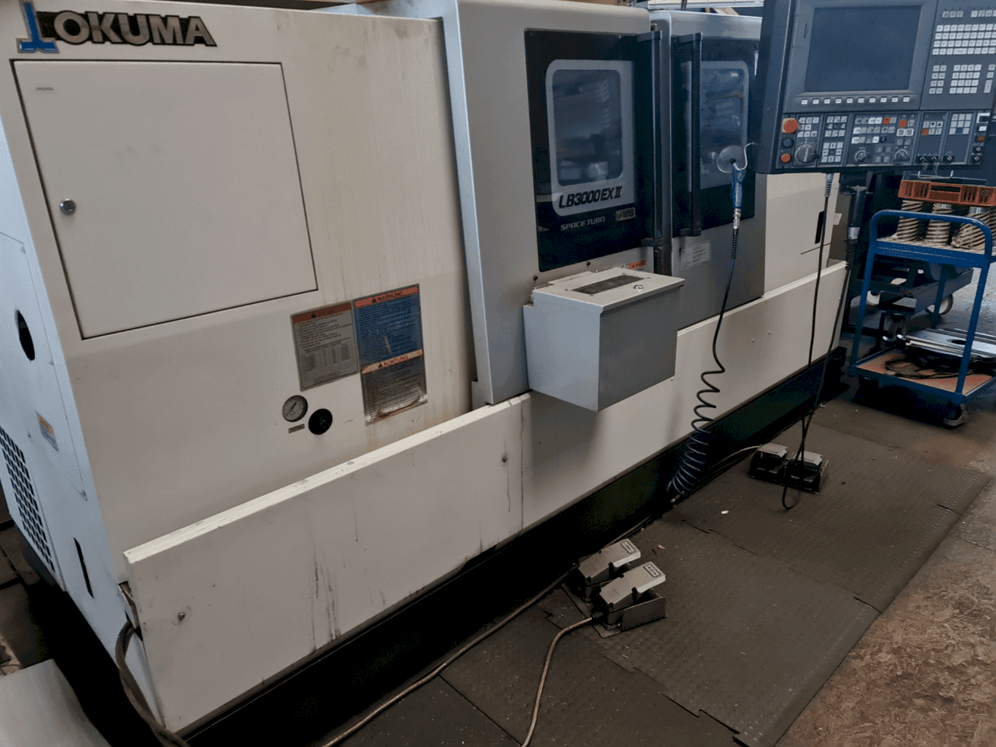 Mašīnas Okuma LB3000 EX II pretskats