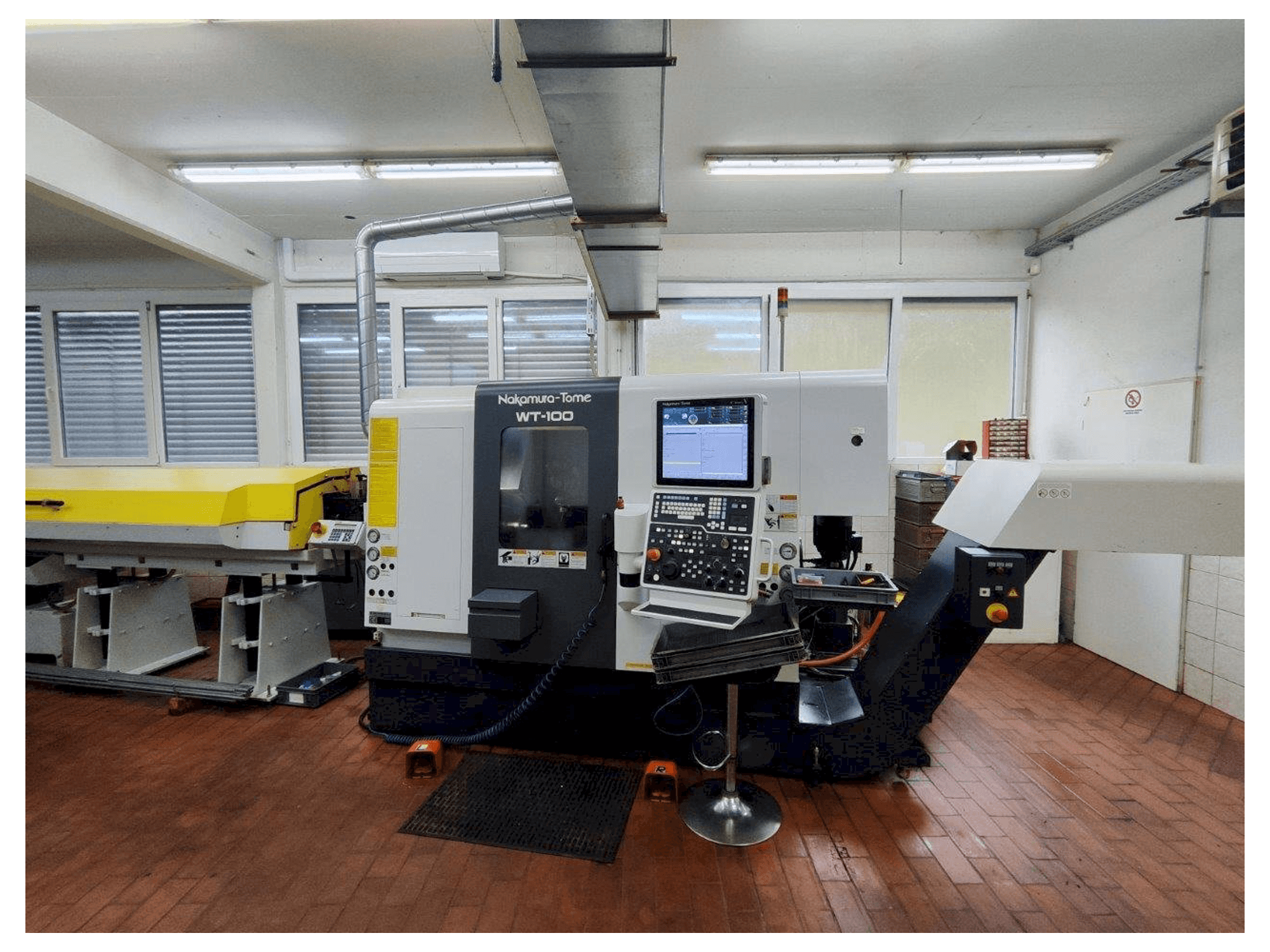 Mašīnas NAKAMURA-TOME WT-100 MMY pretskats