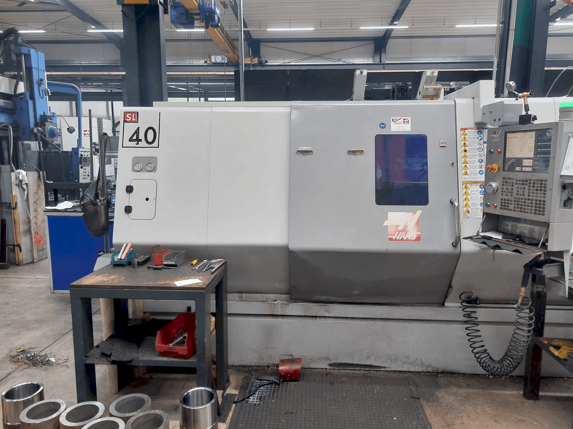 Mašīnas HAAS SL-40 pretskats