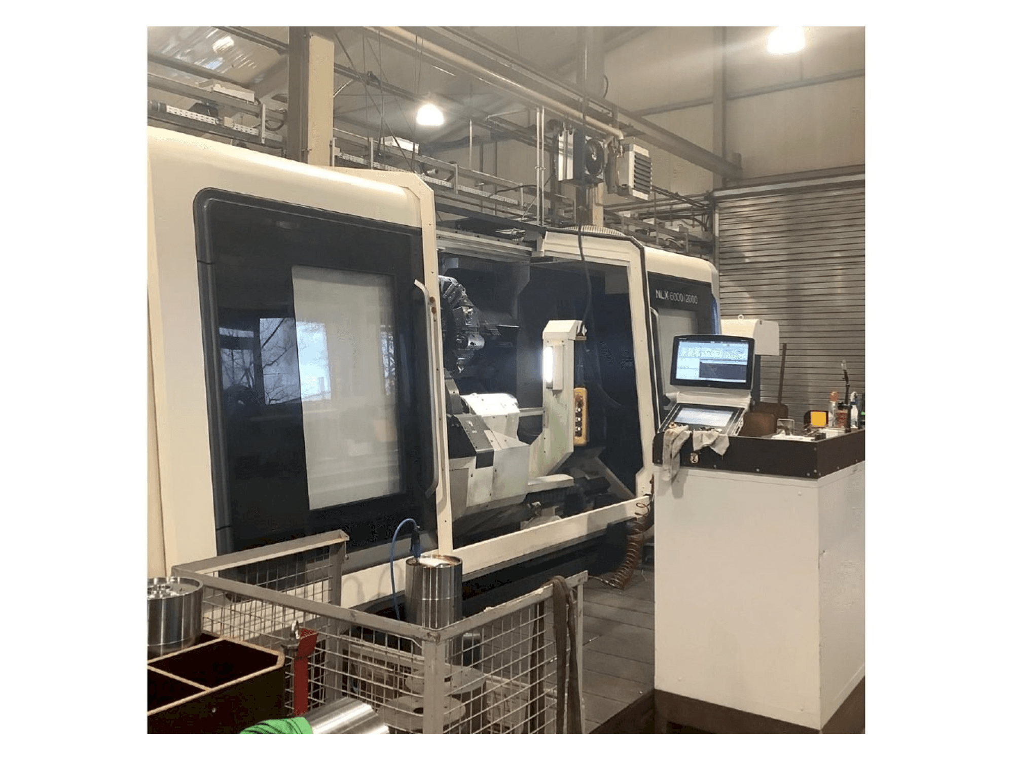 Mašīnas DMG MORI NLX 6000 | 2000 pretskats
