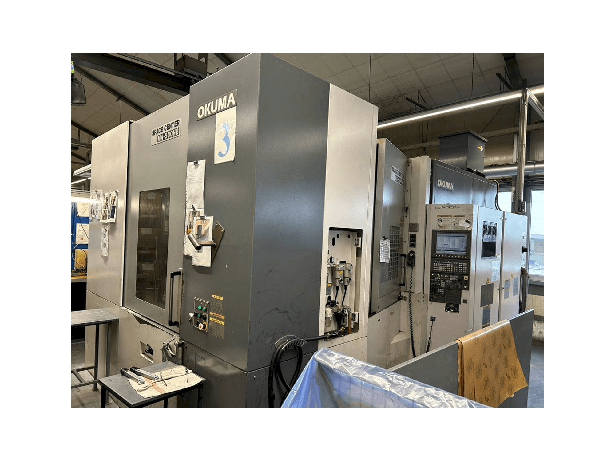 Mašīnas Okuma MA 500HB skats no kreisās puses