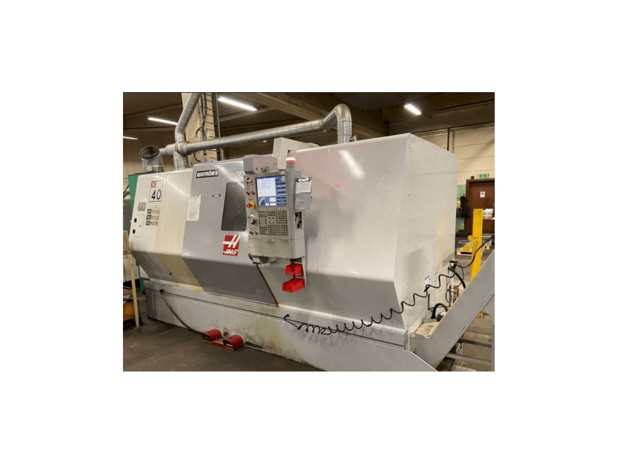 Mašīnas HAAS SL-40 pretskats