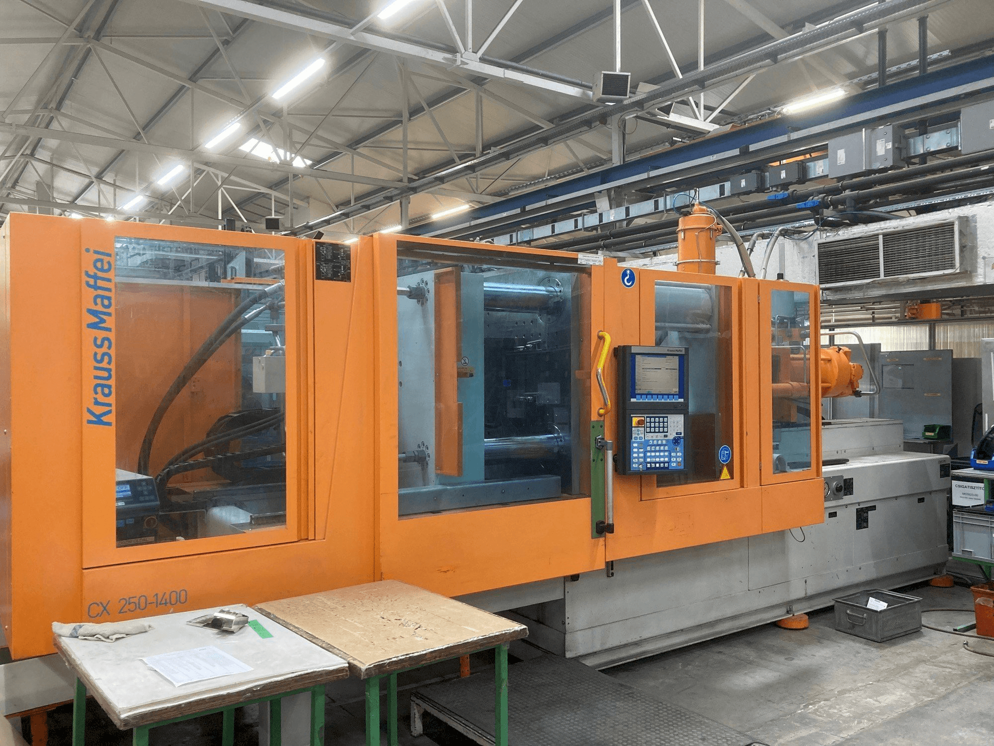 Mašīnas Krauss Maffei KM 250-400 CX pretskats