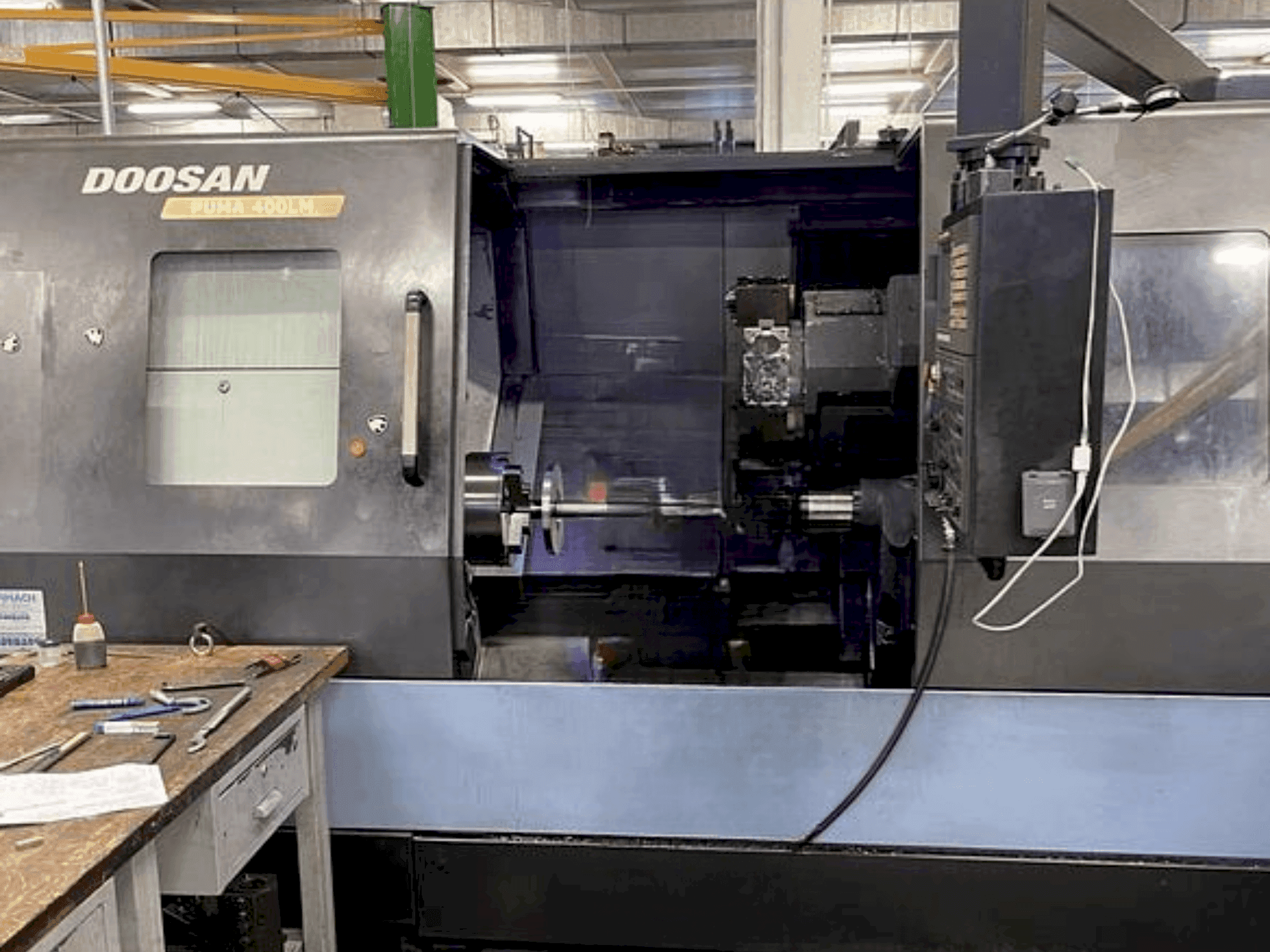 Mašīnas DOOSAN Puma 400 LMA pretskats