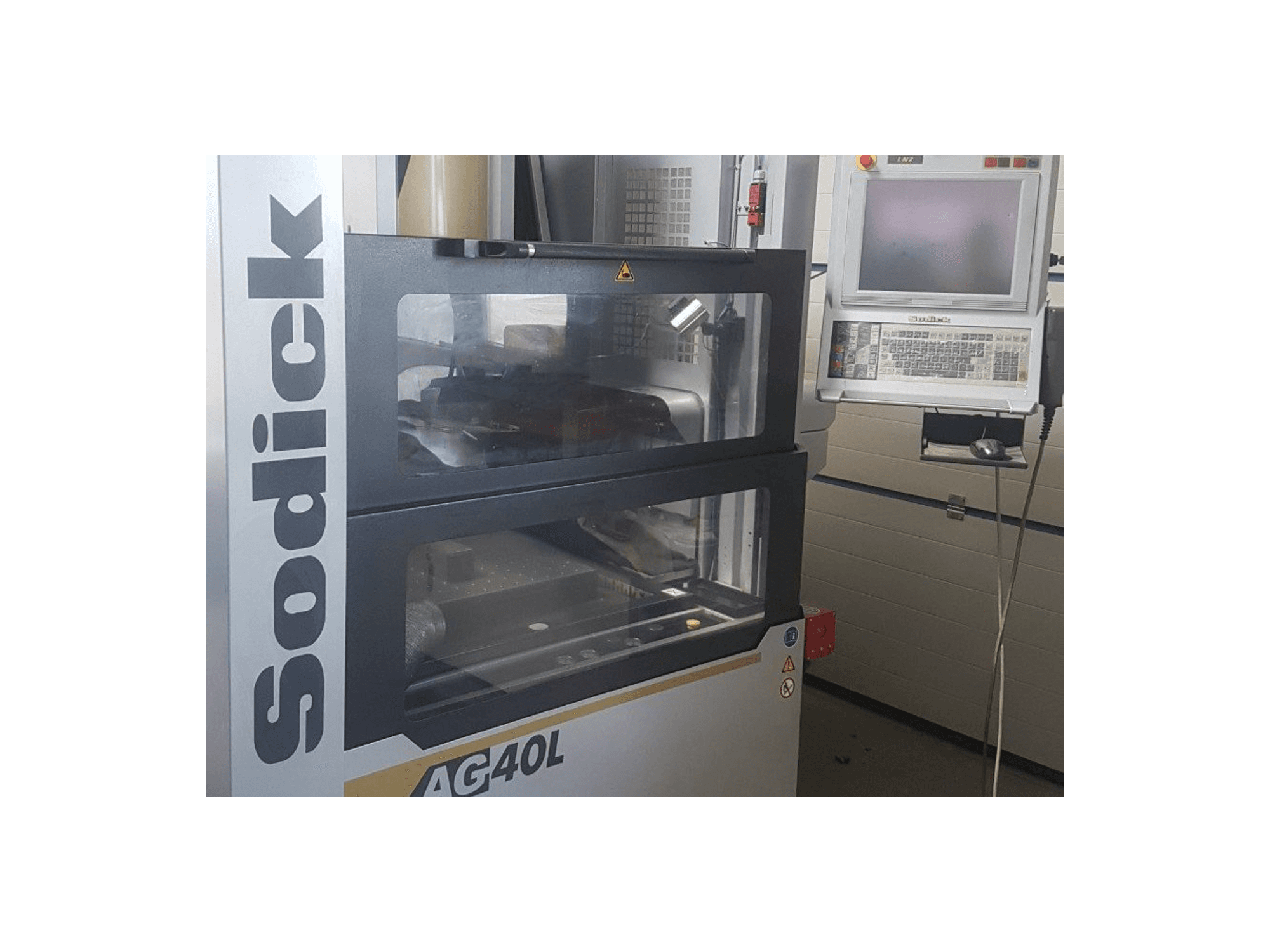 Mašīnas Sodick AG40L pretskats