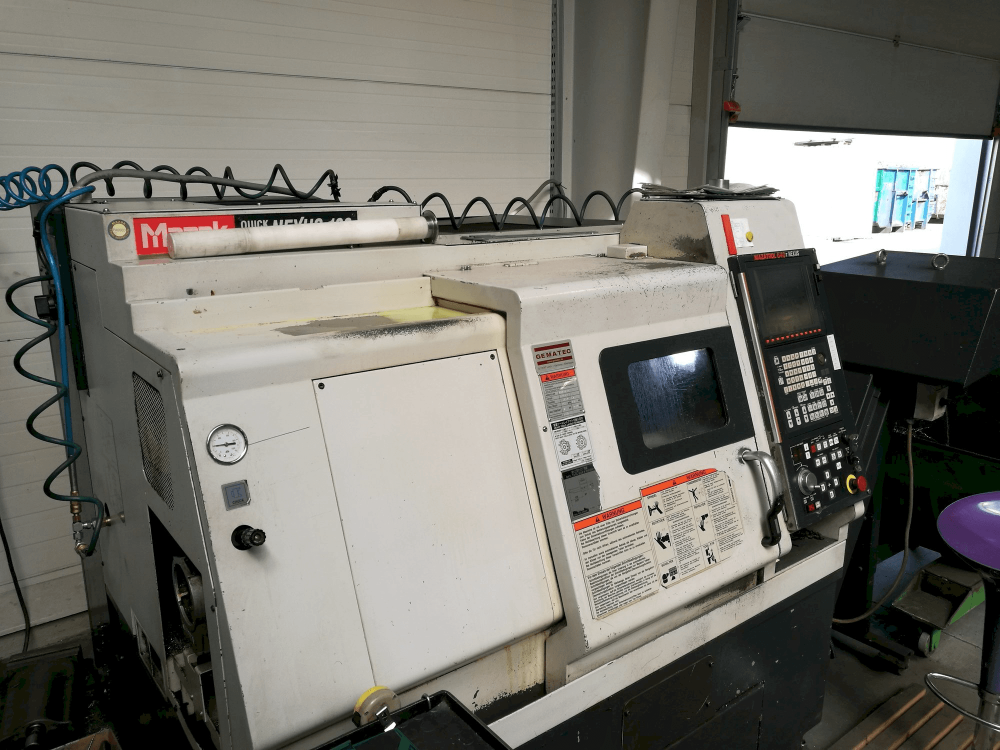 Mašīnas Mazak QT NEXUS 100 kreisās malas skats