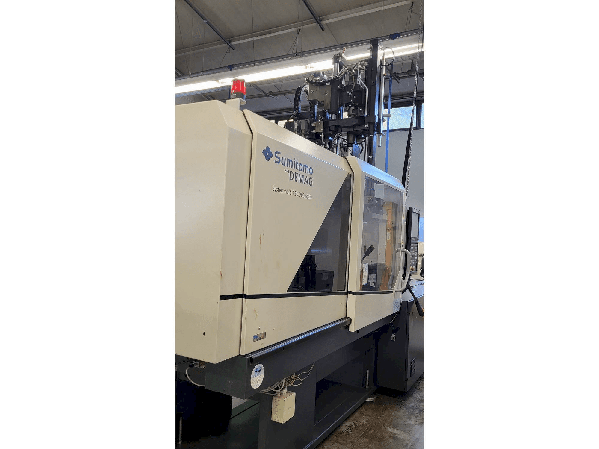 Mašīnas Sumitomo SHI DEMAG Systec Multi 120/470-200h/80V kreisās malas skats
