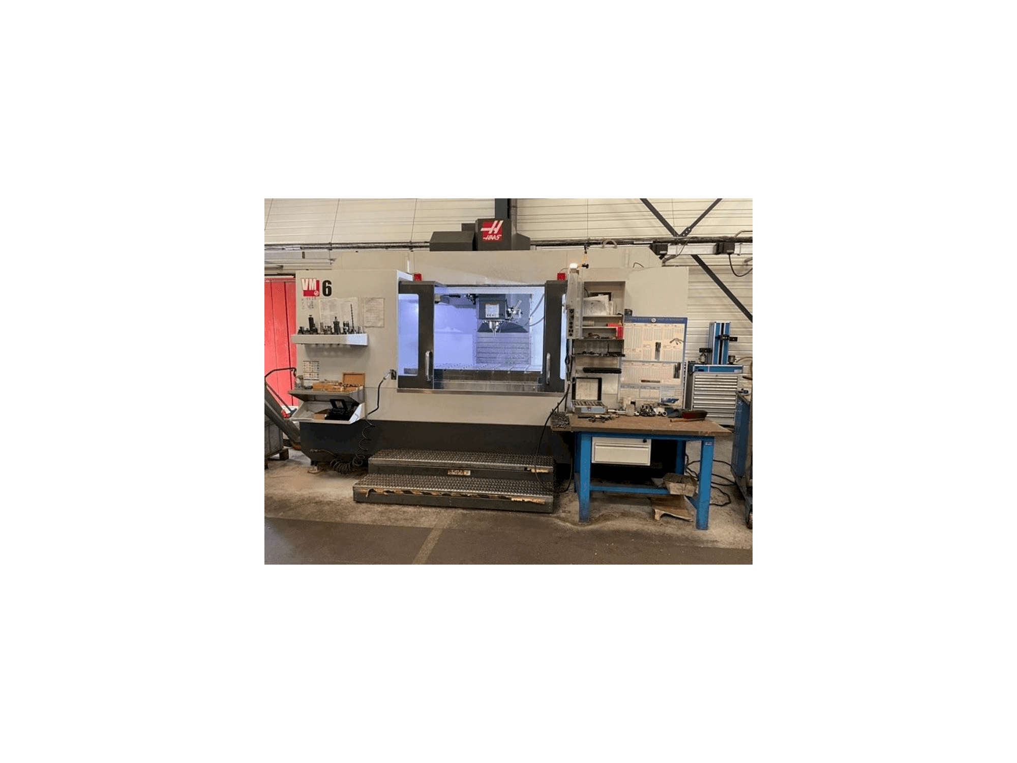 Mašīnas HAAS VM-6 pretskats