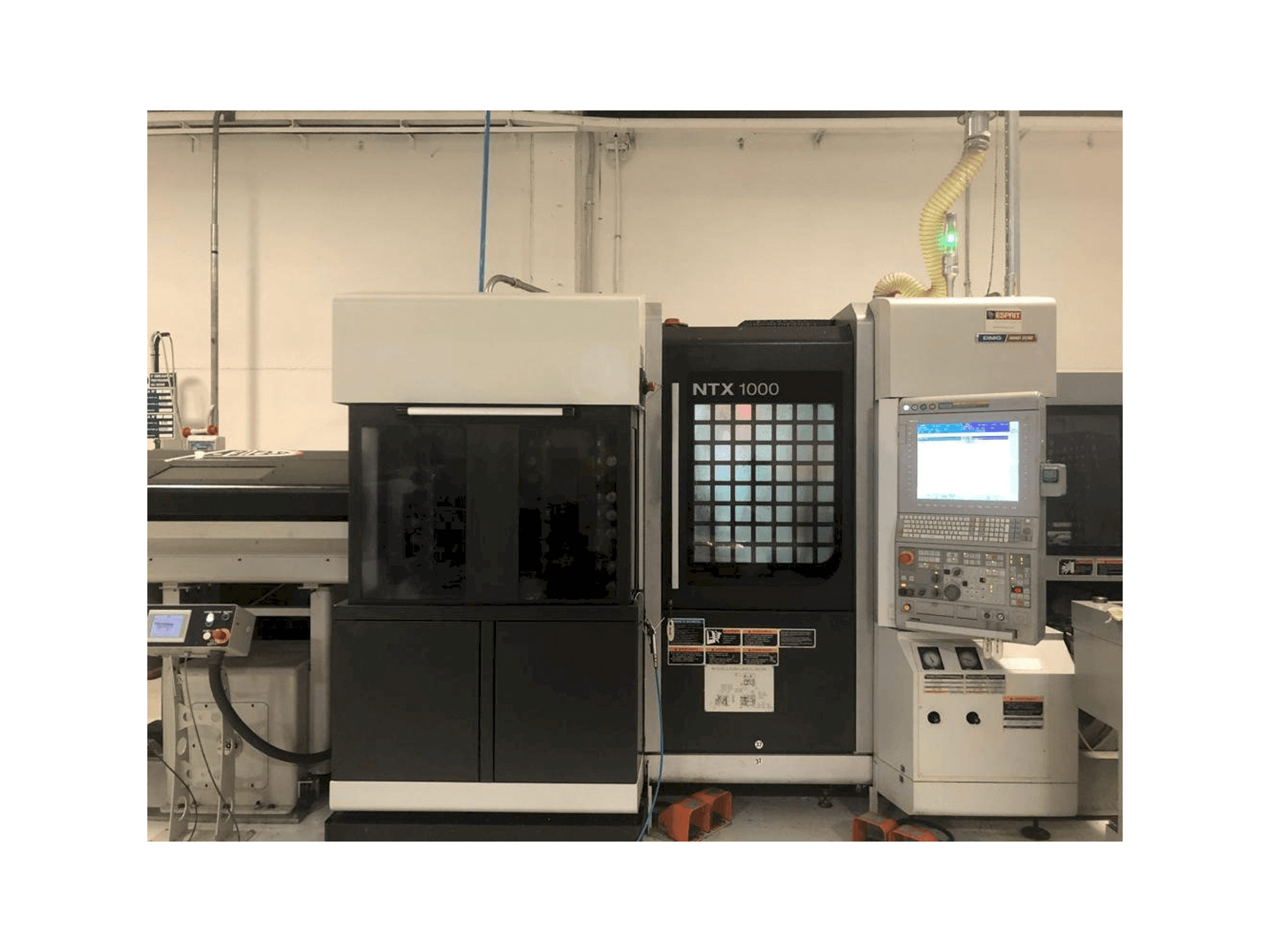 Mašīnas MORI SEIKI NTX1000 pretskats