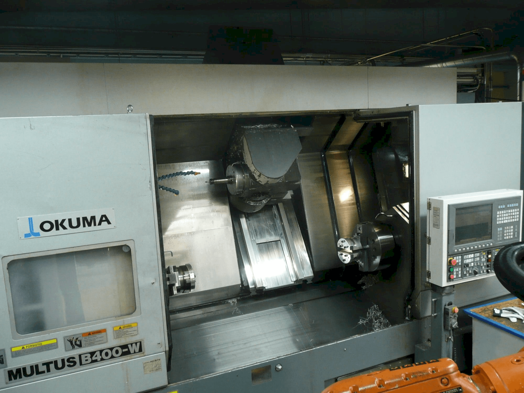 Mašīnas Okuma MULTUS B400-W pretskats