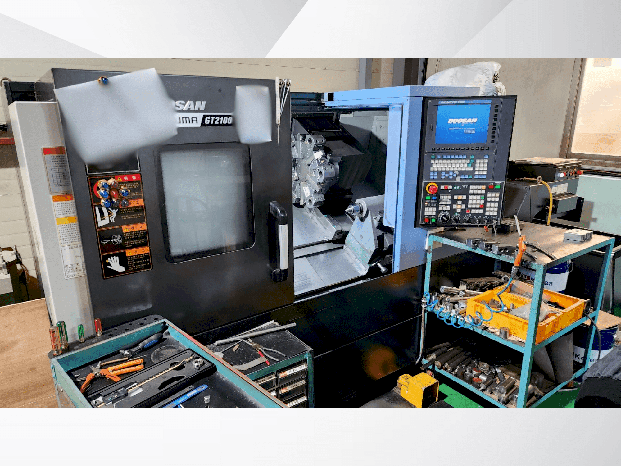 Mašīnas DOOSAN PUMA GT2100 pretskats