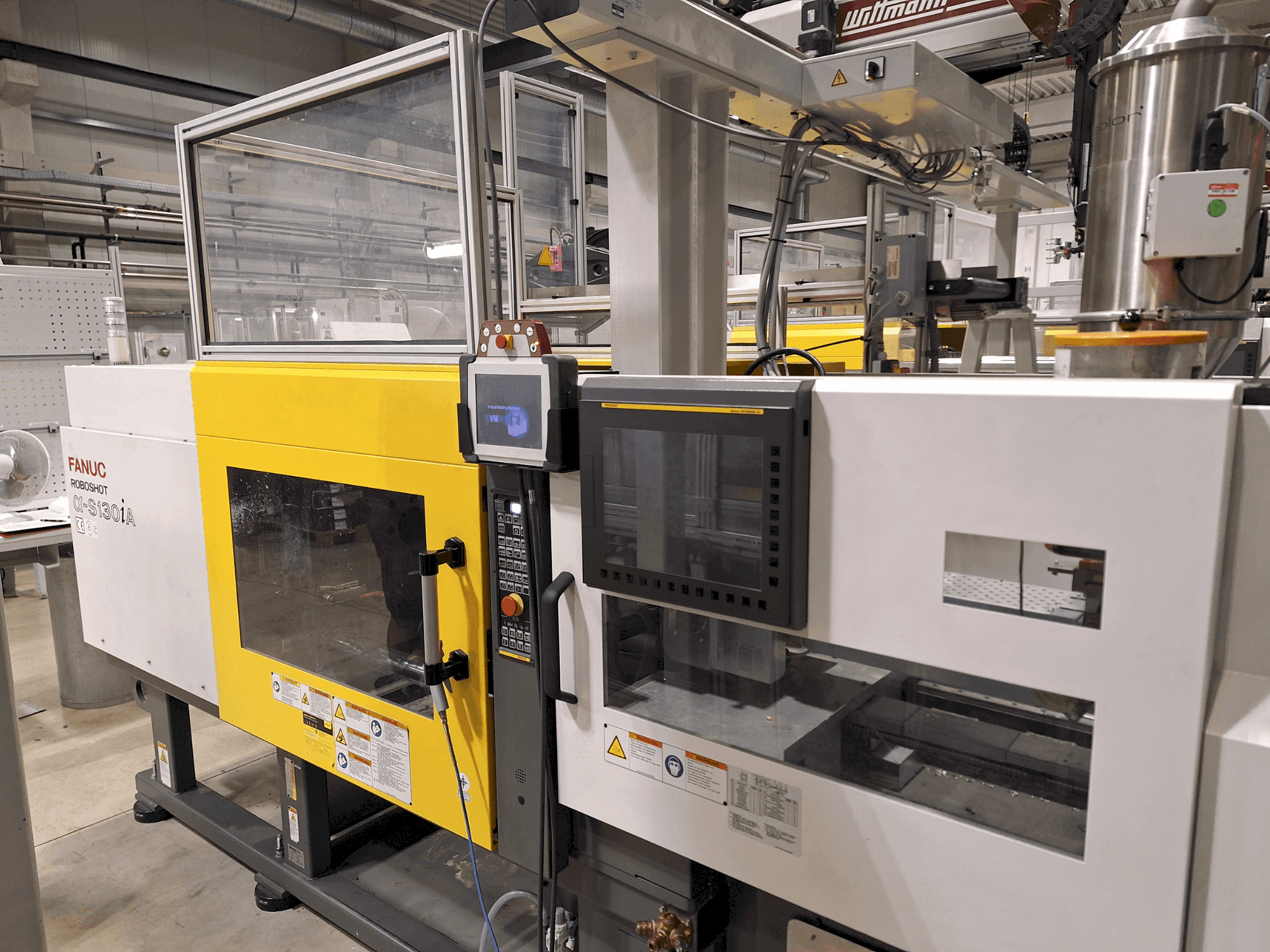 Mašīnas FANUC Roboshot S130iA pretskats
