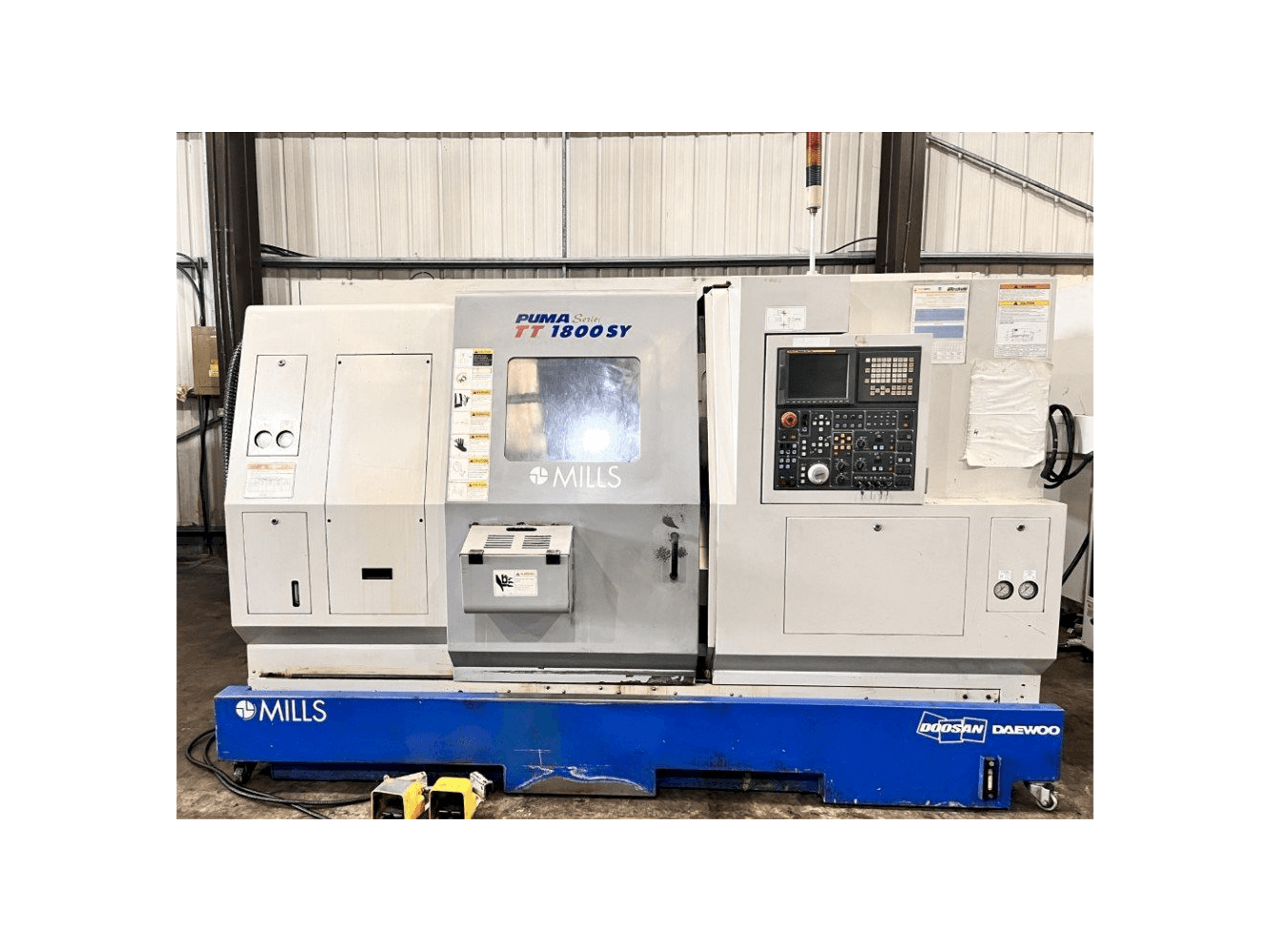 Mašīnas Doosan TT1800SY pretskats