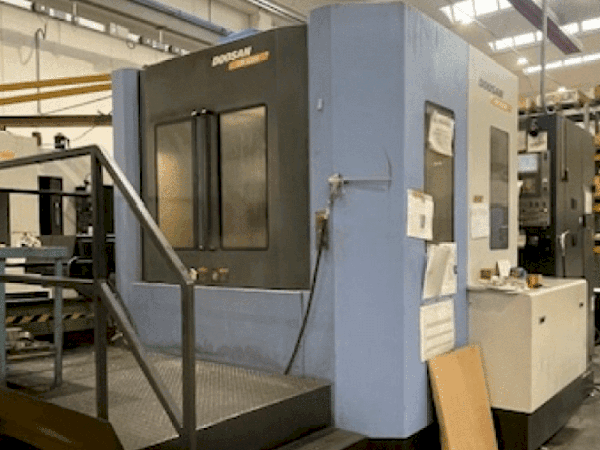 Mašīnas DOOSAN HM 6300 (2009) pretskats