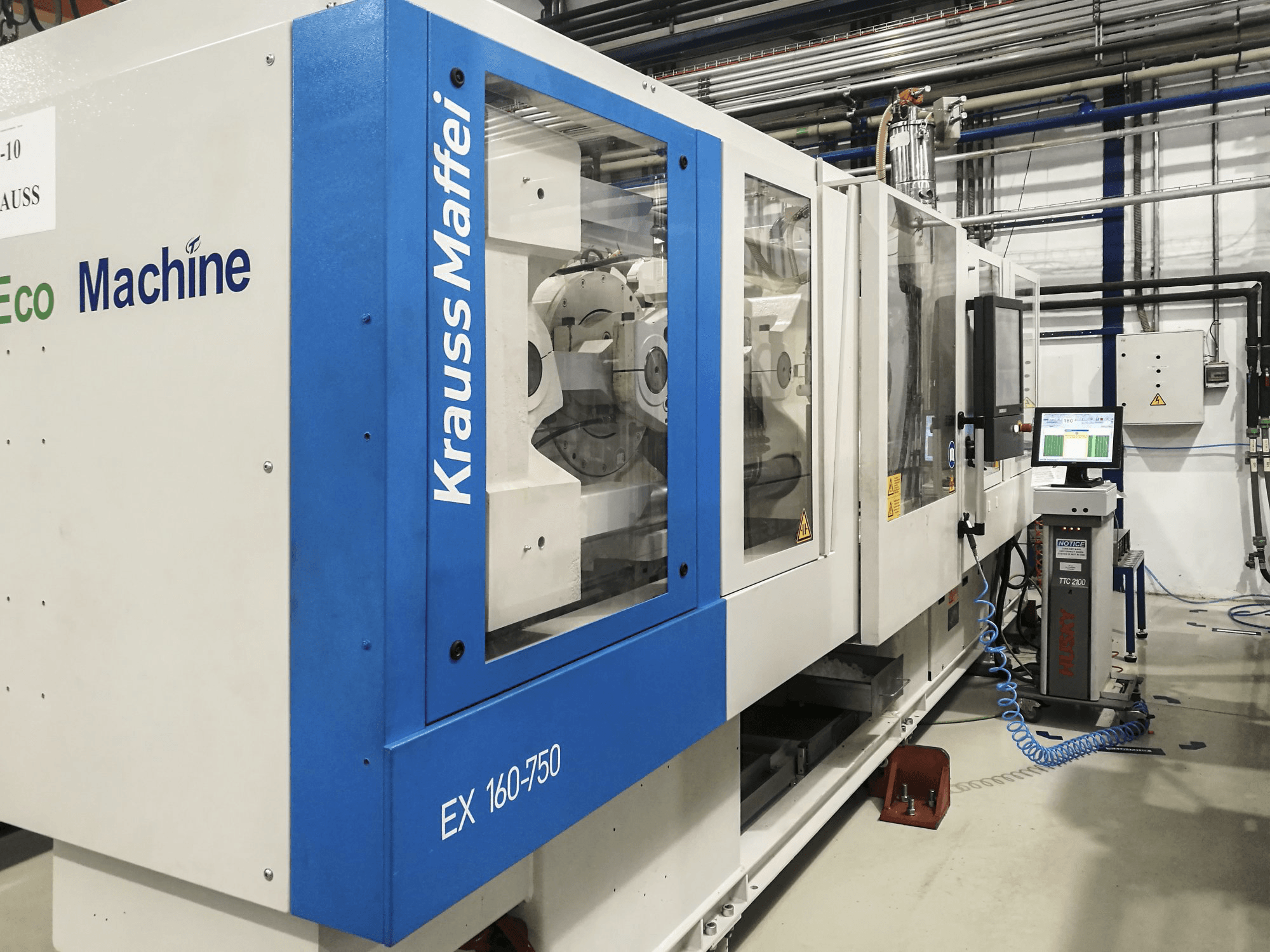 Mašīnas Krauss Maffei 160-750 EX skats no kreisās puses