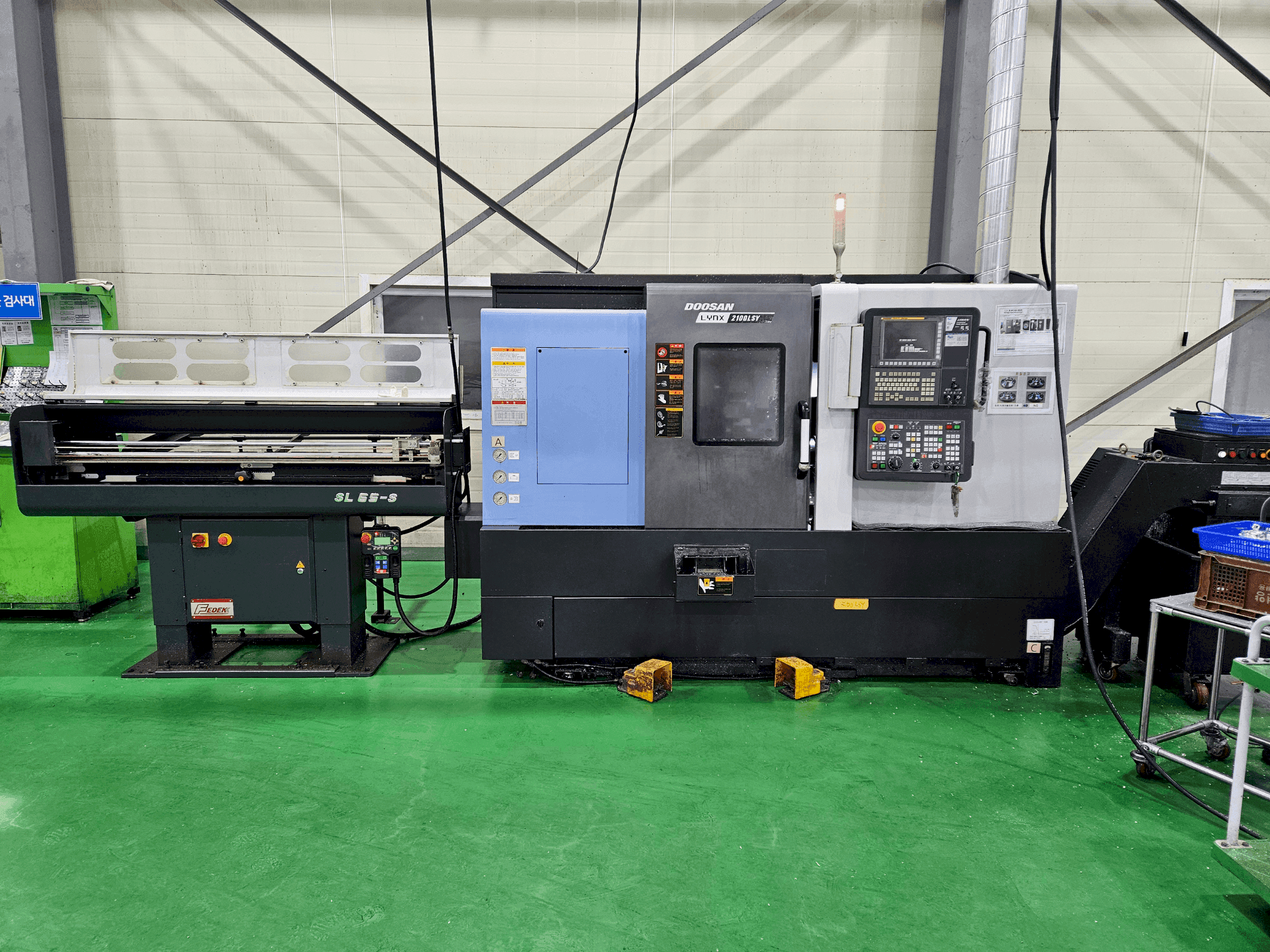 Mašīnas DOOSAN LYNX 2100 LSYB pretskats