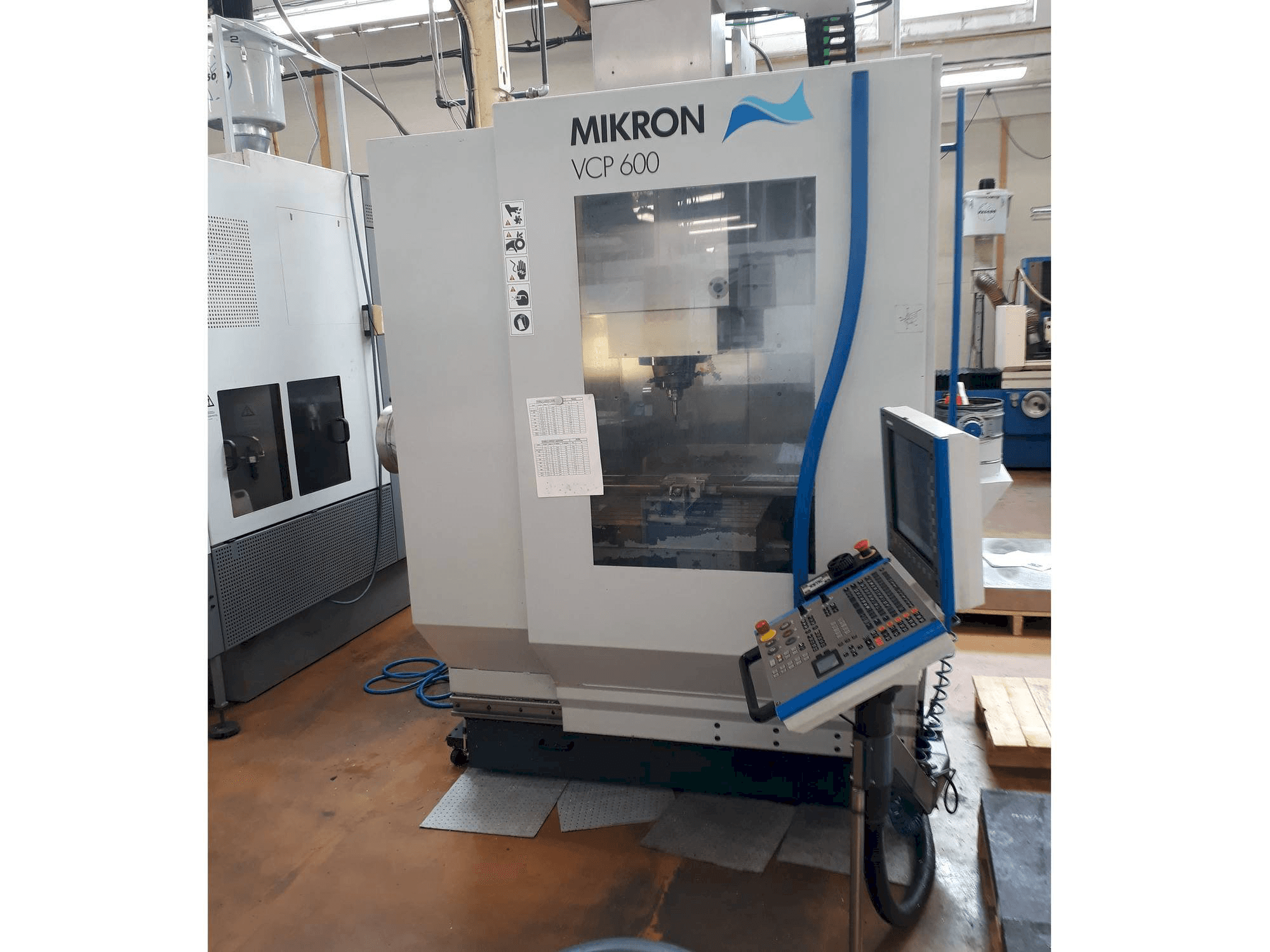 Mašīnas MIKRON VCP 600 pretskats