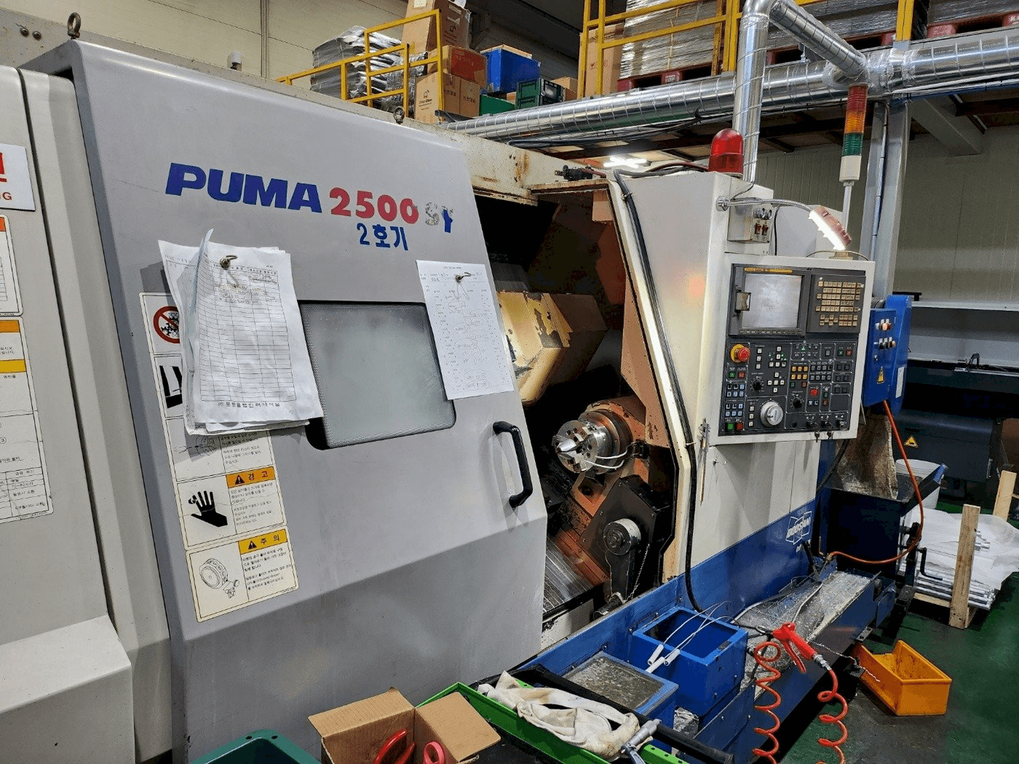 Mašīnas DOOSAN PUMA 2500SY pretskats
