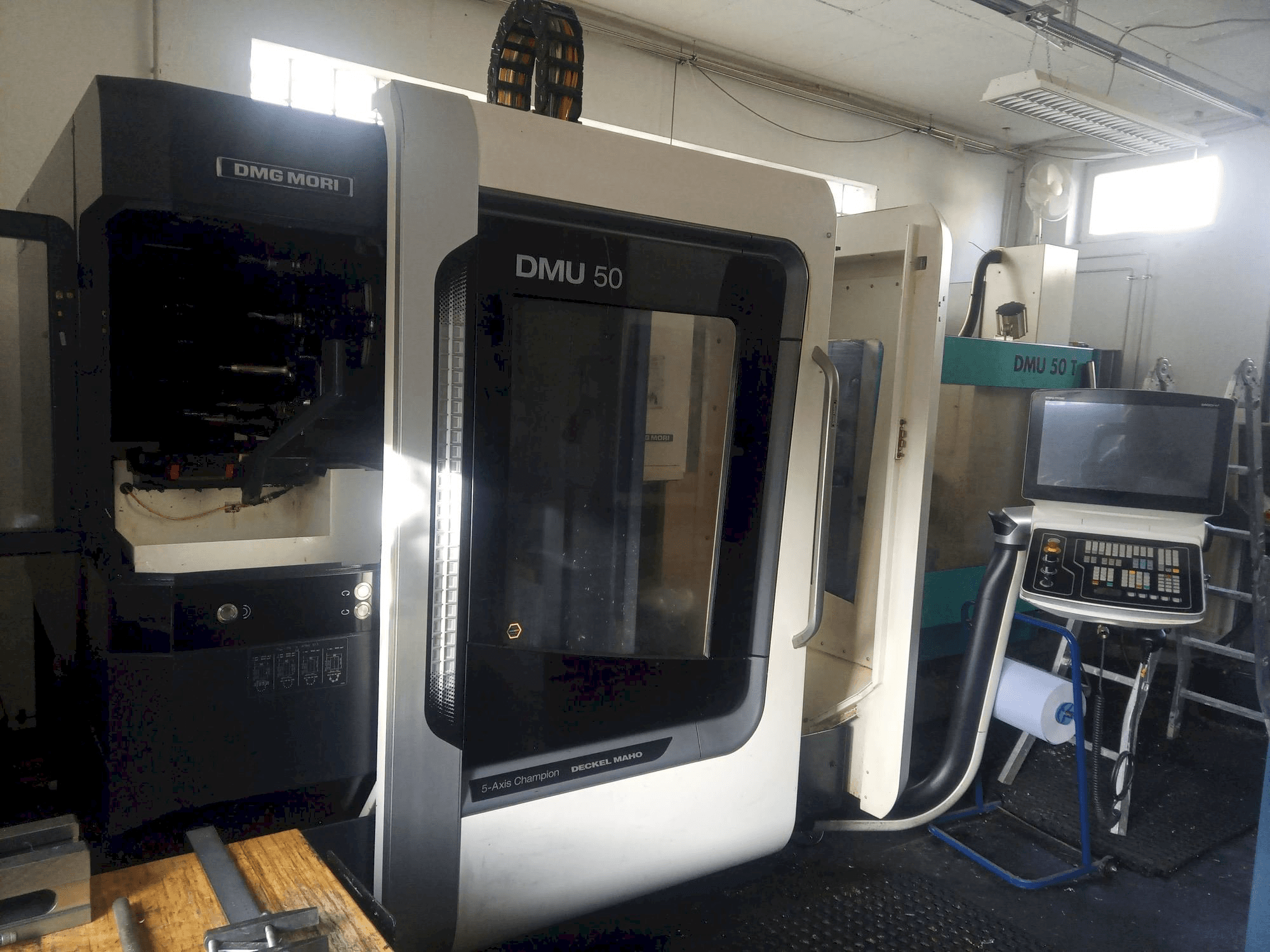 Mašīnas DMG MORI DMU 50 pretskats
