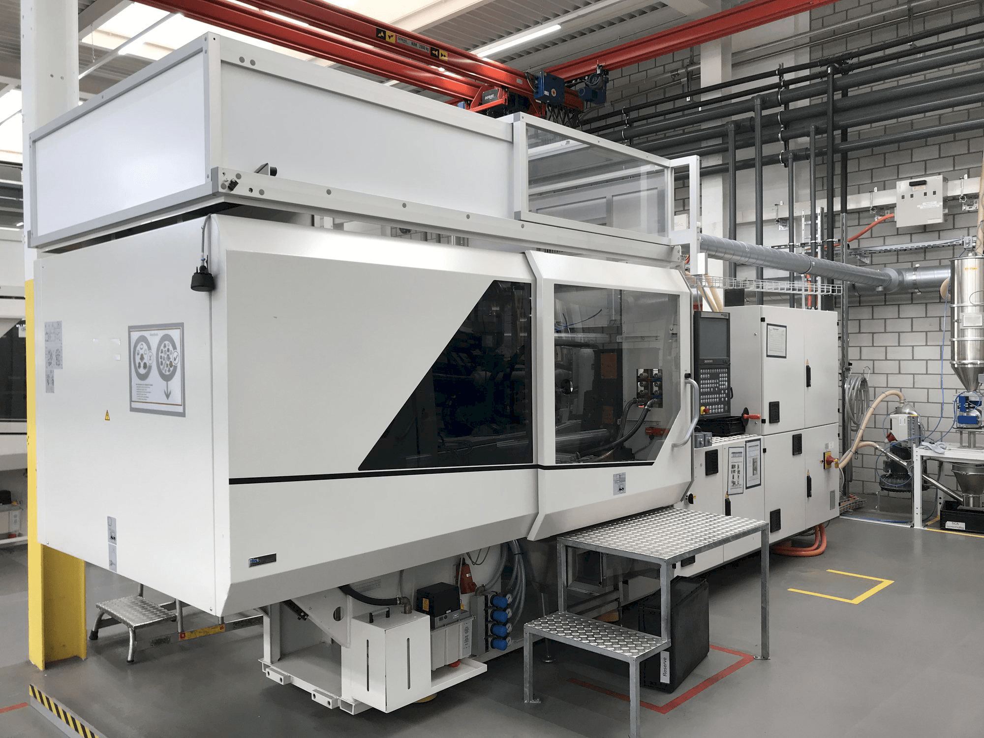 Mašīnas Sumitomo Demag EL-EXIS SP 150/500-475 kreisās malas skats