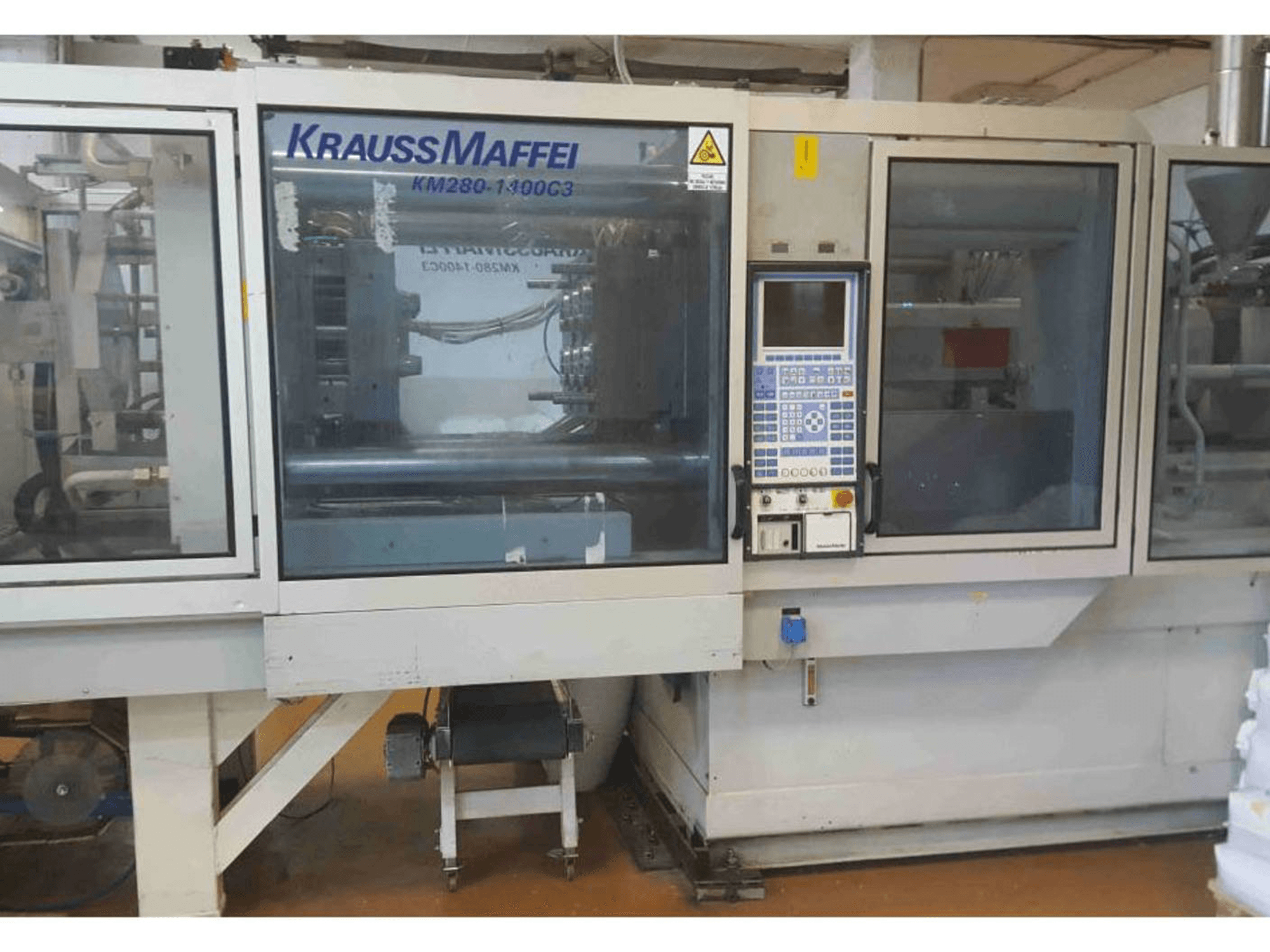 Mašīnas Krauss Maffei KM 280-1400 C3 pretskats