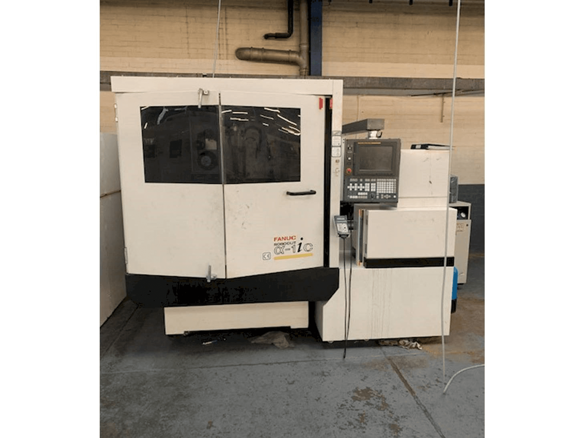 Mašīnas FANUC ROBOCUT Alpha -1iC S Axis pretskats