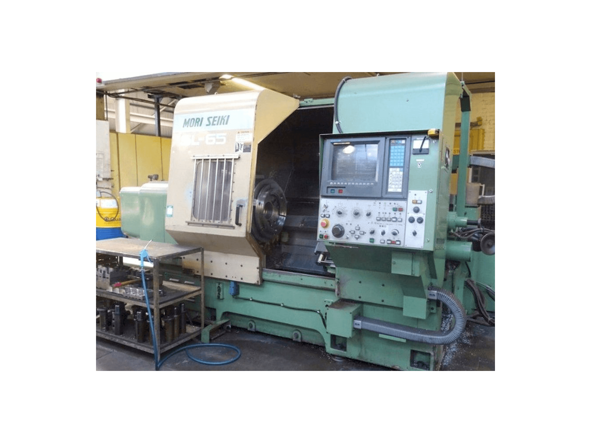 Mašīnas MORI SEIKI Sl65 pretskats