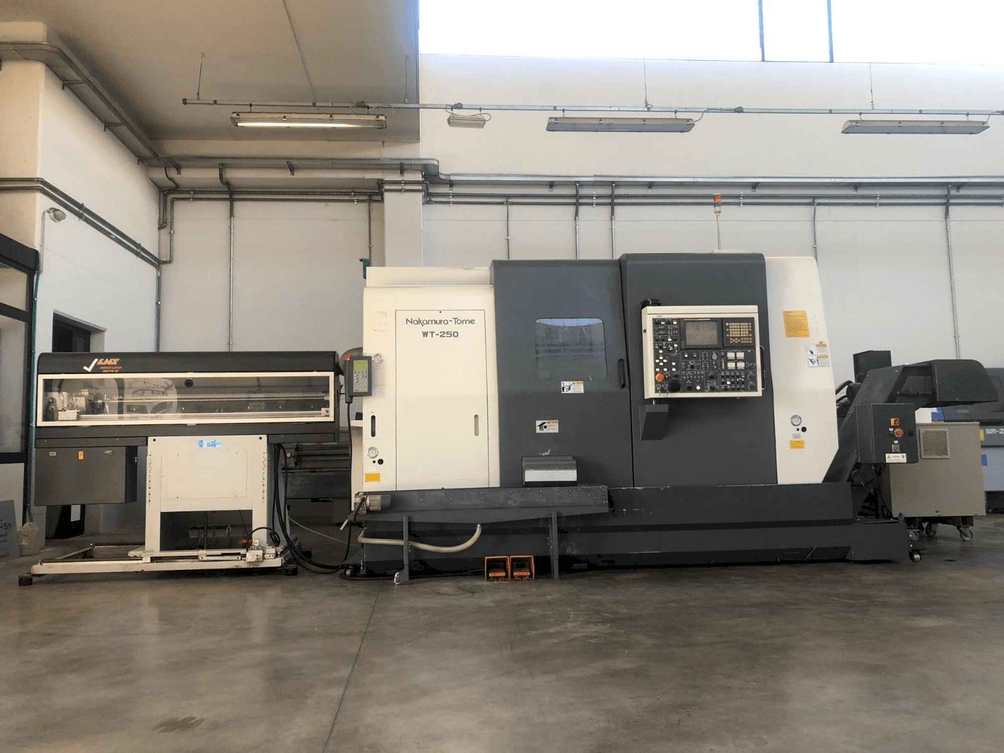 Mašīnas NAKAMURA-TOME WT-250 MMY pretskats