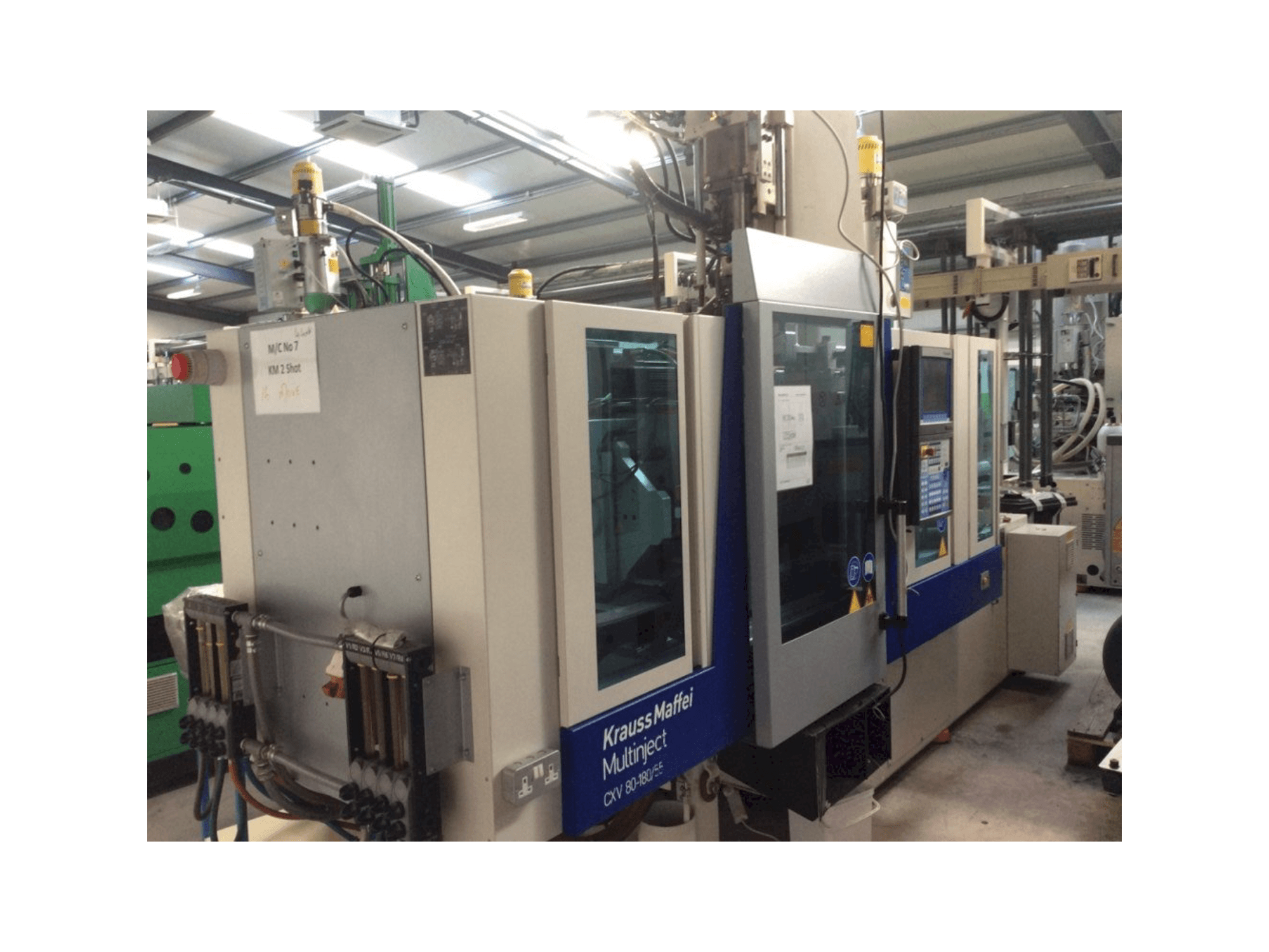 Mašīnas Krauss Maffei Multinject 80-180-55 CX V pretskats
