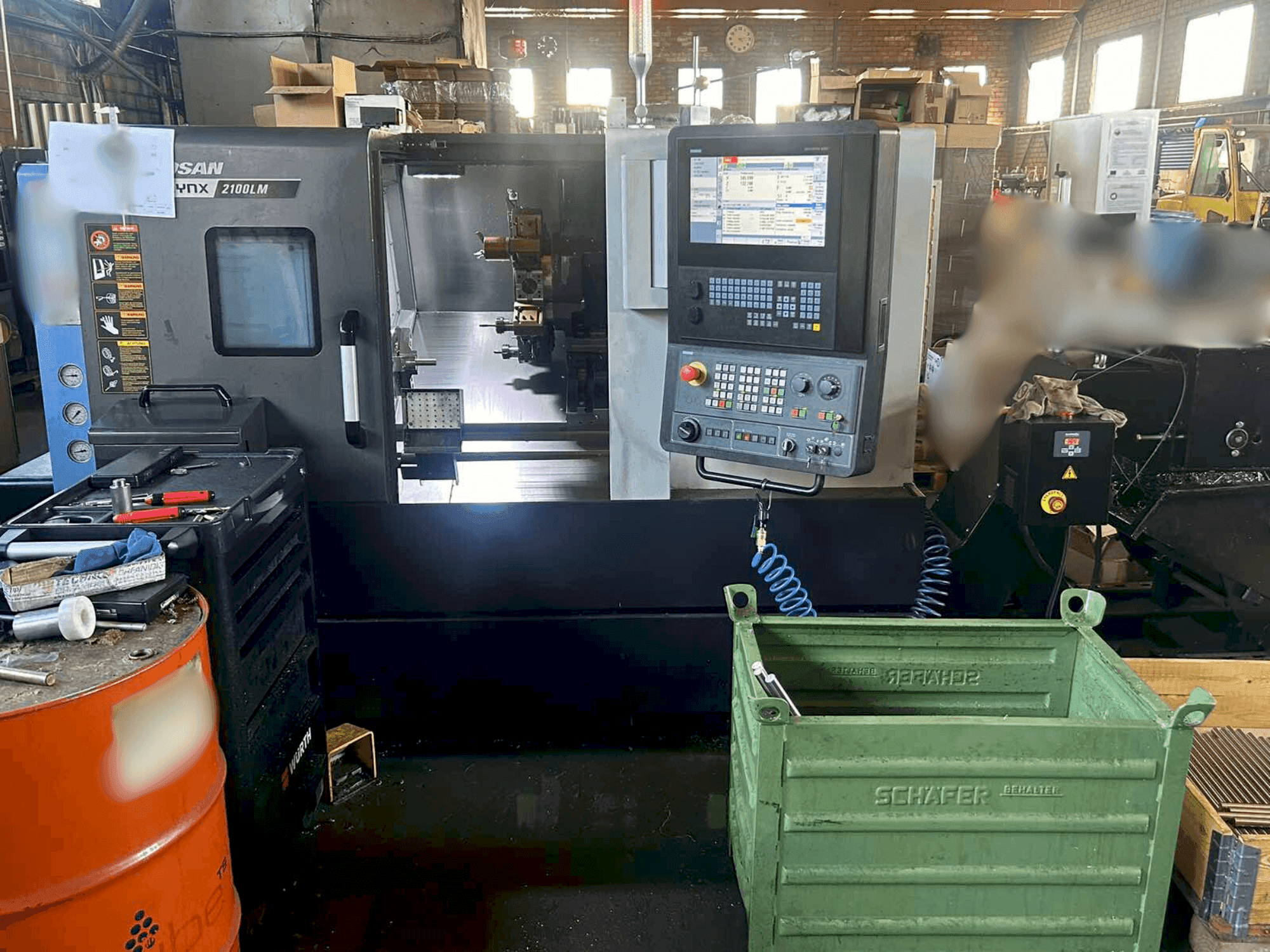 Mašīnas DOOSAN LYNX 2100 LMB pretskats