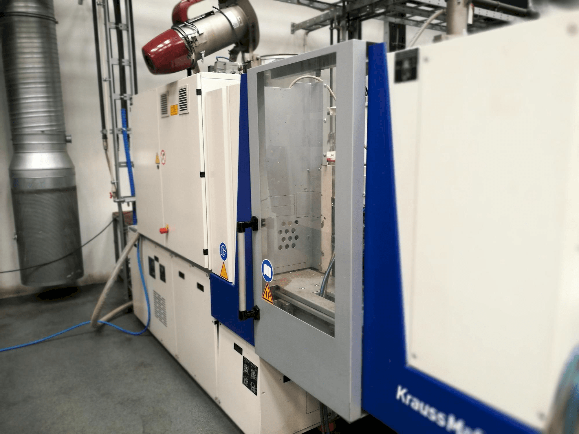 Mašīnas Krauss Maffei KM 35-55 CX pretskats