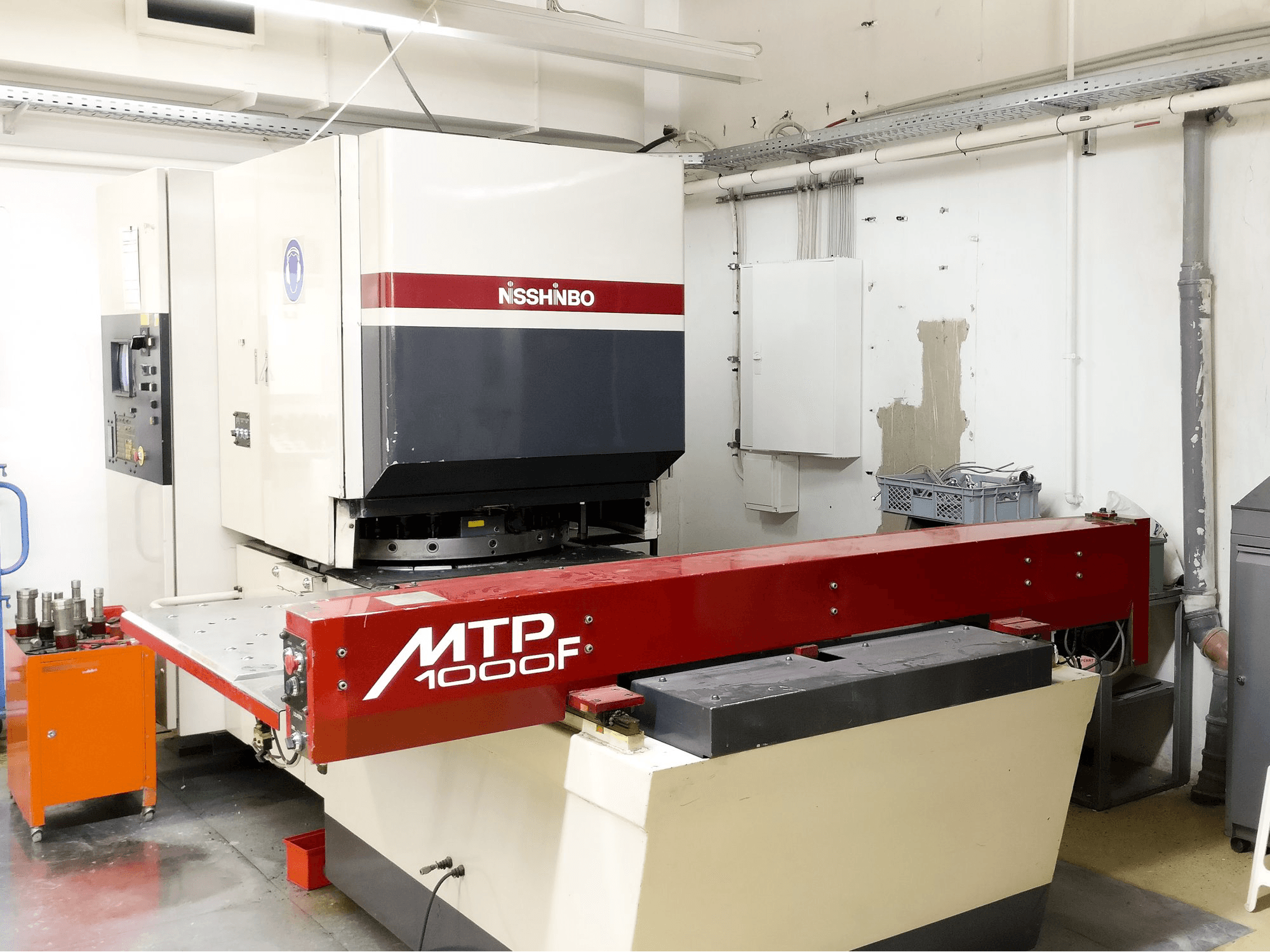 Mašīnas Nisshinbo MTP-1000F skats no kreisās puses