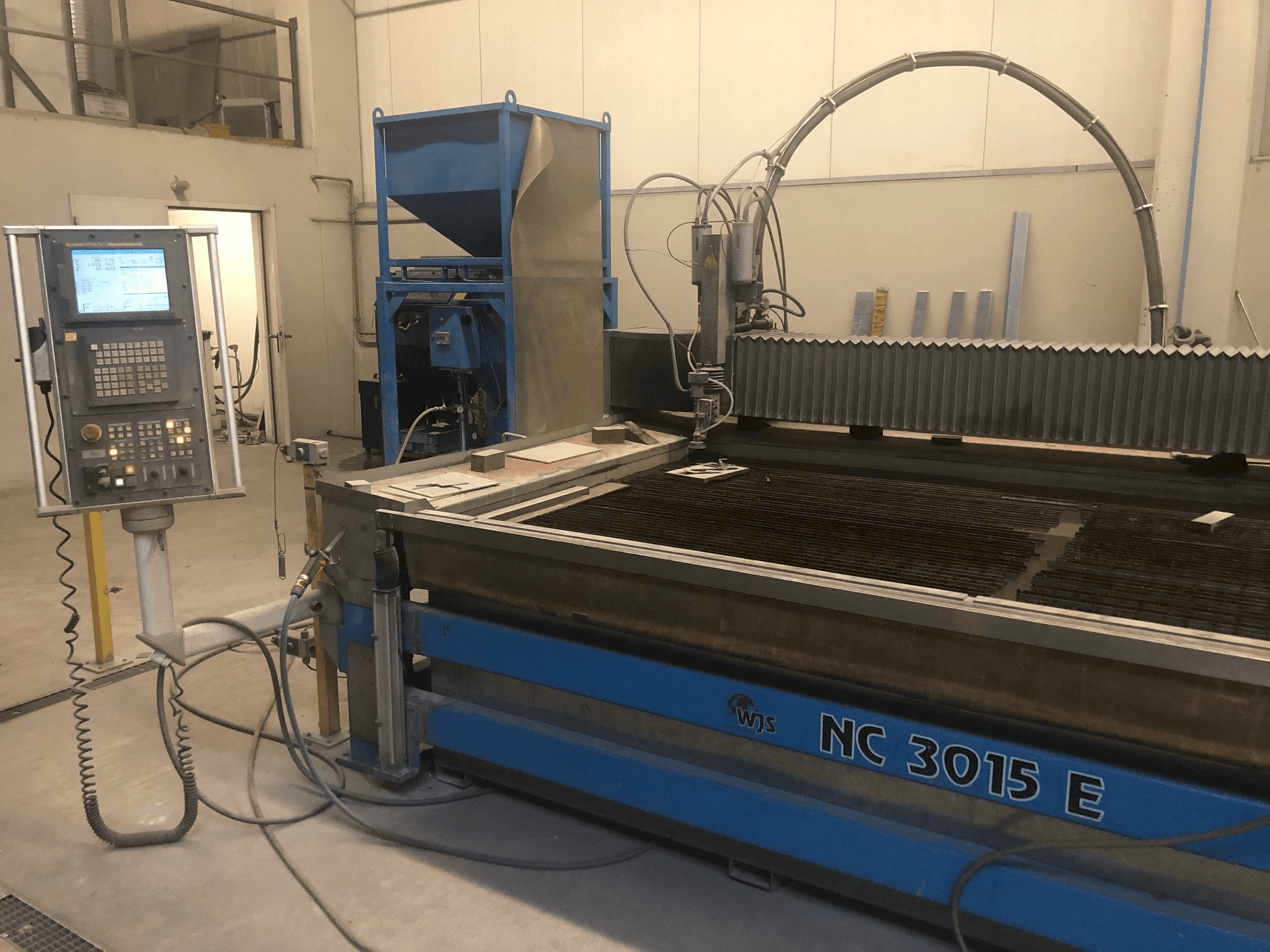 Mašīnas WJS NC 3015 E pretskats